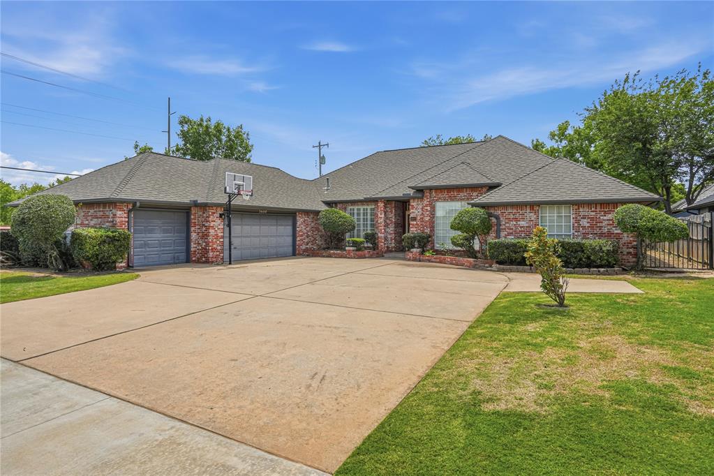 TWO MASTER SUITES! Located in Brookhaven in Norman, this beautifully maintained 4 bedroom, 3 bathroom home offers a traditional layout with plenty of space, separation, and flexibility for everyday living. Featuring a mother-in-law floor plan with two primary suites, two living areas, and two dining spaces, this home was designed for comfort and privacy with room for everyone to spread out. The main living room is anchored by a gorgeous red brick fireplace with built-in library shelving and also features a wet bar, creating a warm and inviting space to gather. The kitchen offers plenty of counter and cabinet space for all of your essentials and flows naturally into the main living area. All bedrooms are comfortably sized and versatile for your needs. Step outside to a covered patio perfect for enjoying Oklahoma summer nights, plus a backyard storage area for added convenience. Storm shelter in the garage provides extra peace of mind. Conveniently located close to shopping, dining, and entertainment. Schedule your private tour today!