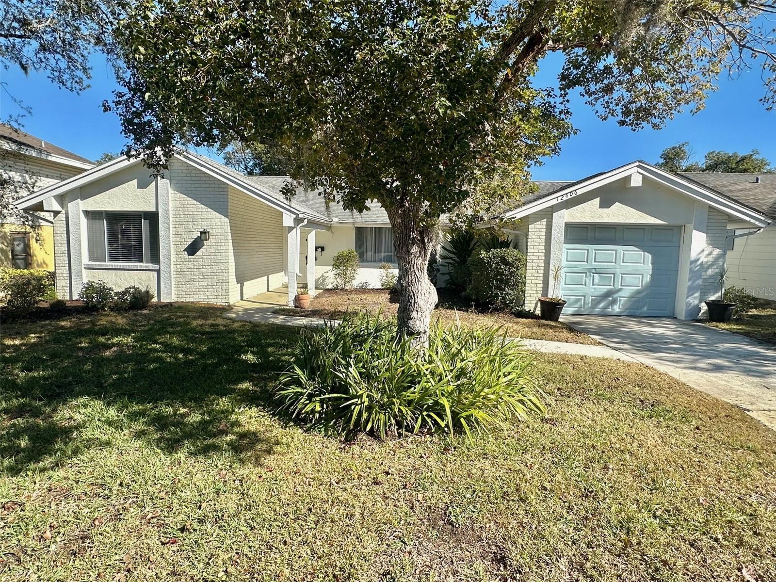 WATERFRONT & AFFORDABLE ! This Move in Ready home features an oversized 1/3 acre oasis with no rear neighbors on the edge of meandering Bear Creek. Home boast multiple upgrades none better then the new 18ft kitchen with loads of self close cabinetry, solid counters, stainless appliances  & sink, plus a pass through window to the 47 ft screened Lanai overlooking the huge treed back yard. The master suite has walk in closet and ensuite bath with new double vanity and step down shower. Rather you want a year round or vacation home you'll enjoy the brightness of the sun's natural light through the two sliding glass doors and oversized windows in every room. Seperate living and family rooms, huge rear lanai and rear yard offers multiple living areas for the family and or friends to find peace and relaxation or for large fun gatherings. Move in and schedule a back yard bon-fire to cook the hot dogs and have fun cleaning up the brush from the tree that recently fell in a storm then relax along side the creek enjoying your favorite beverage. Experience the Country feeling yet in the middle of the city in this very popular Beacon Woods community which features an array of amenities including a 18 hole golf course ,an active community clubhouse, sparkling community pool and tennis courts. You want Affordable Waterfront ? Call today!!