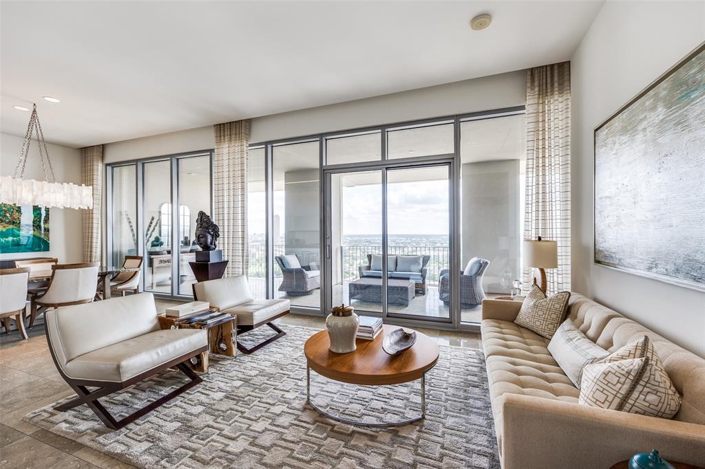 Experience the best in luxury high rise living in the Lionel Morrison designed One Arts Plaza building! Located in the heart of the Arts District, this one bedroom, one and a half bath residence is within walking distance to the Dallas Museum of Art, Meyerson Symphony Center, Moody Performance Hall, and Winspear Opera House. Elegance abounds in this sleek and modern unit with eleven foot ceilings, floor to ceiling windows, and a 50 X 10 foot covered terrace overlooking East Dallas. Natural light flows through the living room and dining area creating an ideal entertaining space, or also a quiet space to just relax. Open Balthaup kitchen offers island, eat in kitchen, Miele appliances, subzero wine cooler plus an integrated refrigerator and freezer.The primary bedroom includes a sliding glass door to the terrace, a spa worthy bathroom with separate tub and shower, and custom closet space. A versatile office space is located off the primary bedroom. In addition to this fabulous downtown Dallas location within close proximity to fine dining and shopping, One Arts amenities include a pool, fitness center, doorman, valet, 24 hour security and concierge, event room, electric car chargers, and two assigned parking spaces.
