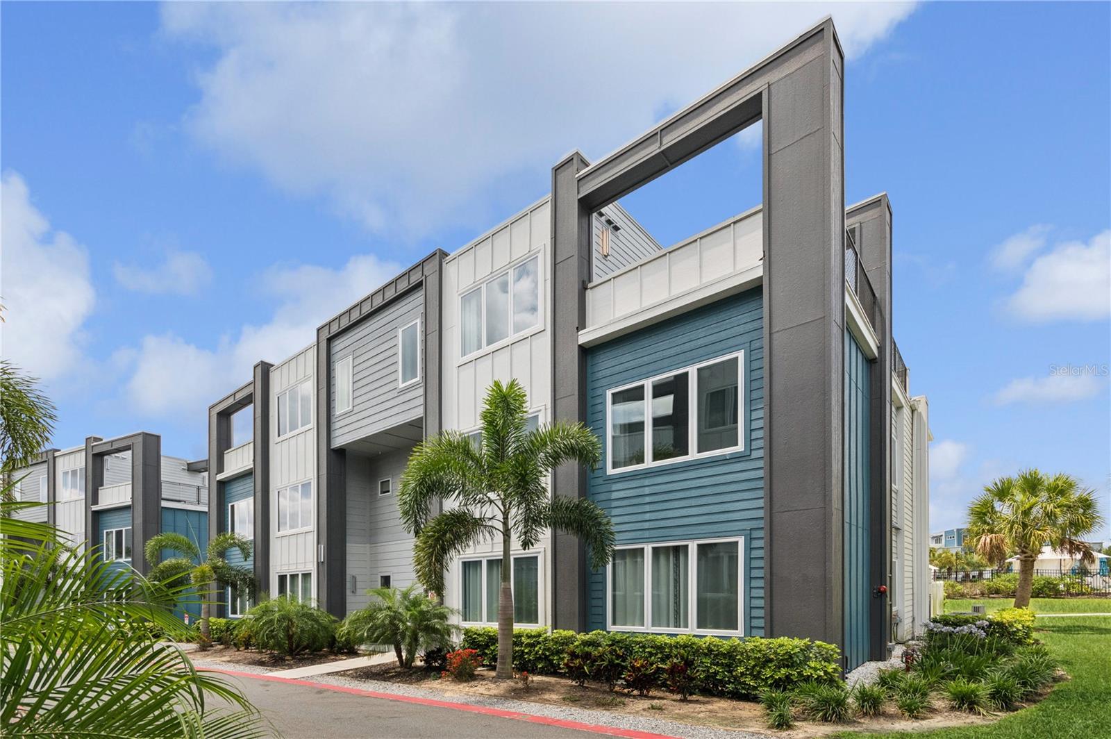 Welcome to an extraordinary opportunity to own a fully furnished, two-story luxury condo in the highly coveted Spectrum at Reunion Resort. Perfectly situated in building nine, this stunning residence masterfully blends modern elegance, comfort, and convenience, just moments away from Orlando's world-renowned attractions, including Walt Disney World, Universal Studios, and SeaWorld. Its prime location also provides seamless access to major highways and Orlando International Airport, making travel effortless.

Step inside and be greeted by a beautifully renovated space where every detail reflects modern sophistication. The open-concept layout is flooded with natural light, showcasing the spacious living area, ideal for both relaxing and entertaining. The gourmet kitchen is a chef's dream, featuring high-end appliances, quartz countertops, and ample storage, perfectly designed for culinary adventures. Upstairs, you’ll find five generously sized bedrooms, including a luxurious master suite with a spa-like en-suite bathroom. Each bedroom is thoughtfully designed to provide comfort and privacy, making it the perfect retreat for family and guests. An additional versatile loft space offers flexibility, easily adapting to your lifestyle needs, whether it's a home office, media room, or relaxation area.

One of the standout features of this exceptional condo is the expansive second-floor terrace, a unique amenity not commonly found in the community. Imagine enjoying evening dinner parties under the Florida sky or sipping your morning coffee with serene views of the lush landscape.

As part of Spectrum at Reunion, residents enjoy access to a wealth of world-class amenities, including an expansive clubhouse with concierge service, a resort-style pool with cabanas, a state-of-the-art fitness center, playgrounds for family fun, and on-site dining options. Whether you're lounging by the pool or enjoying a workout, every day feels like a vacation.

Not only is this condo the perfect getaway for family vacations, but its proven history of strong rental income also makes it an attractive investment opportunity. Coupled with the community’s commitment to safety and security, you can rest easy knowing your investment is well-protected. Whether you are seeking a luxury vacation retreat, a prime rental property, or both, this stunning residence at Spectrum at Reunion delivers on every level.

Schedule your private showing today and step into the Florida lifestyle you’ve always dreamed of!