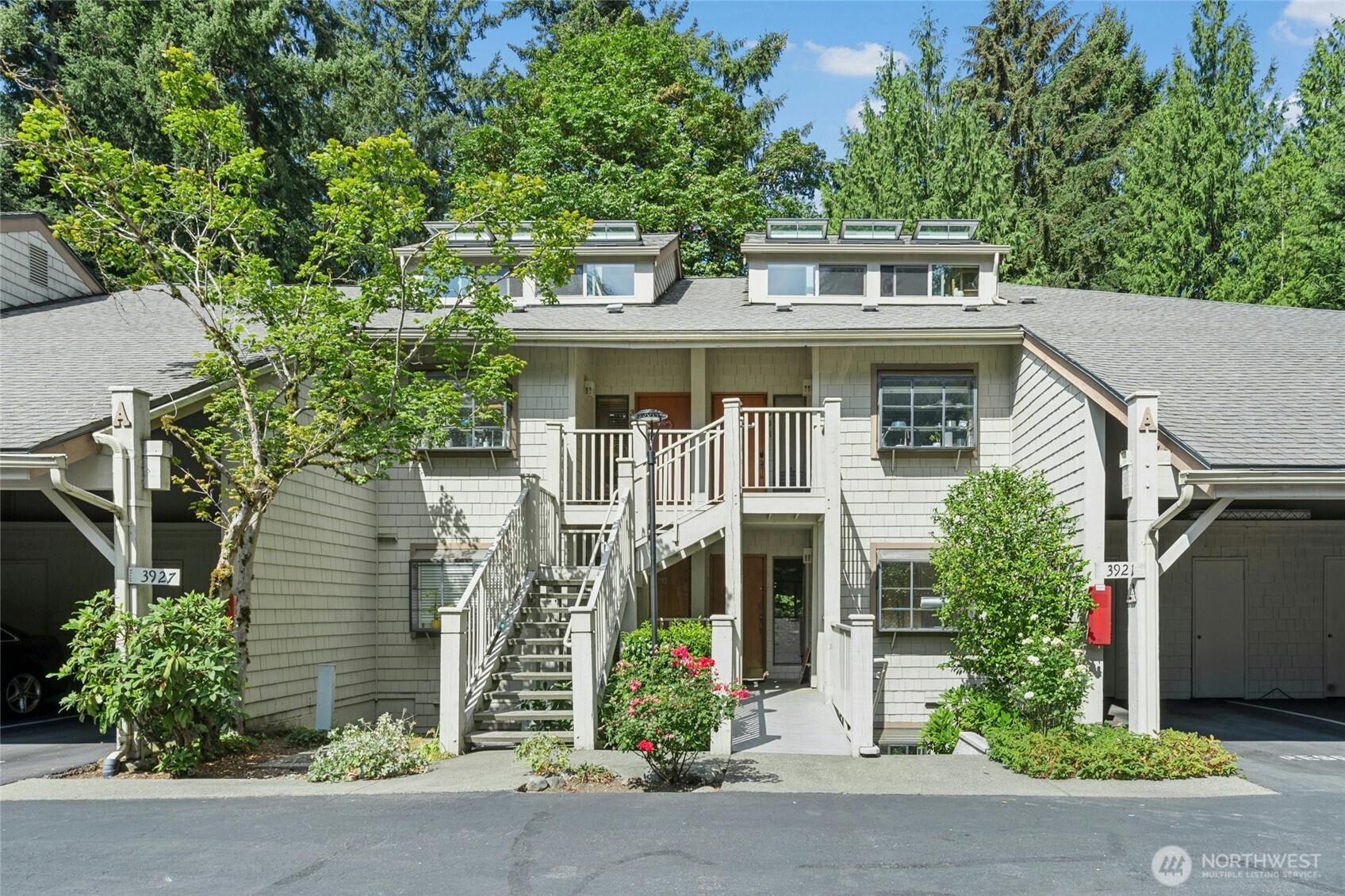 Discover an exceptional opportunity in a sought-after Bellevue location. This spacious ground-floor condo features 2 bedrooms, 1.5 baths, and 1,110 square feet of comfortable living space. Its practical layout is well suited for everyday living and entertaining. Inside, you’ll find an updated kitchen and bathrooms, hardwood floors, and an inviting fireplace for cozy evenings on cooler nights. Step onto the oversized deck and enjoy peaceful views of the adjacent greenbelt, with convenient access to the green space behind the home—ideal for pet owners. Additional space for seasonal items and outdoor gear is available in two exterior storage closets. Parking is convenient with two dedicated spaces—one covered carport and one uncovered space. Ideally positioned approximately equidistant from downtown Bellevue and Kirkland, the home offers convenient access to both cities, premier shopping and dining, parks, major employment centers, I-405, and SR-520. The nearby South Kirkland Park-and-Ride also provides easy access to public transit serving Seattle and other Eastside destinations. Whether you’re looking for a primary residence, an Eastside retreat, or an investment opportunity, this home offers an appealing combination of space, convenience, natural surroundings, and value. Come explore the possibilities and make Bellevue living your own!