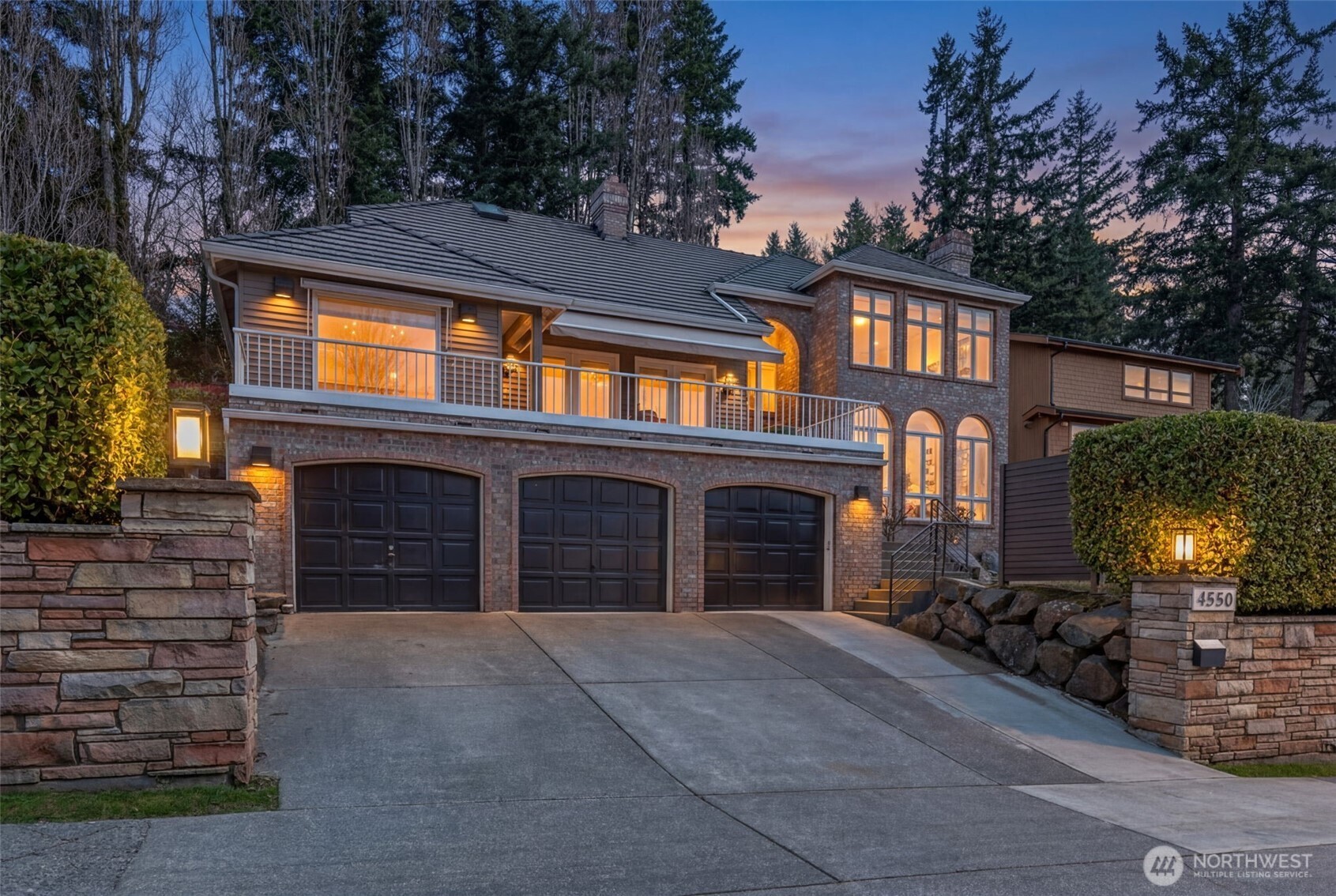 Newly priced and offering exceptional value in Laurelhurst, this beautifully designed 3,850-square-foot residence pairs timeless style with abundant natural light and a versatile floor plan. The main level features a sun-filled living room, an expansive kitchen with adjoining gathering room, a private office, or an additional bedroom and bath. French doors open to a spacious deck overlooking the private 8,170-square-foot lot. The low-maintenance yard is designed for easy upkeep and enjoyment. Additional outdoor space is provided at the neighborhood park and Laurelhurst Beach Club which are both just a short walk away. The retreat inspired primary suite with a luxurious bath, walk-in closet and fireplace is upstairs along with two additional bedrooms, a full bathroom and a bonus room. The finished lower level provides room for media, recreation, fitness, or play. The home includes a three-car garage, with one of the bays currently converted into a private yoga studio. Complete with air conditioning and conveniently located near Seattle Children’s, the University of Washington, and University Village, this home offers comfort and convenience in one of Seattle’s most sought-after neighborhoods.