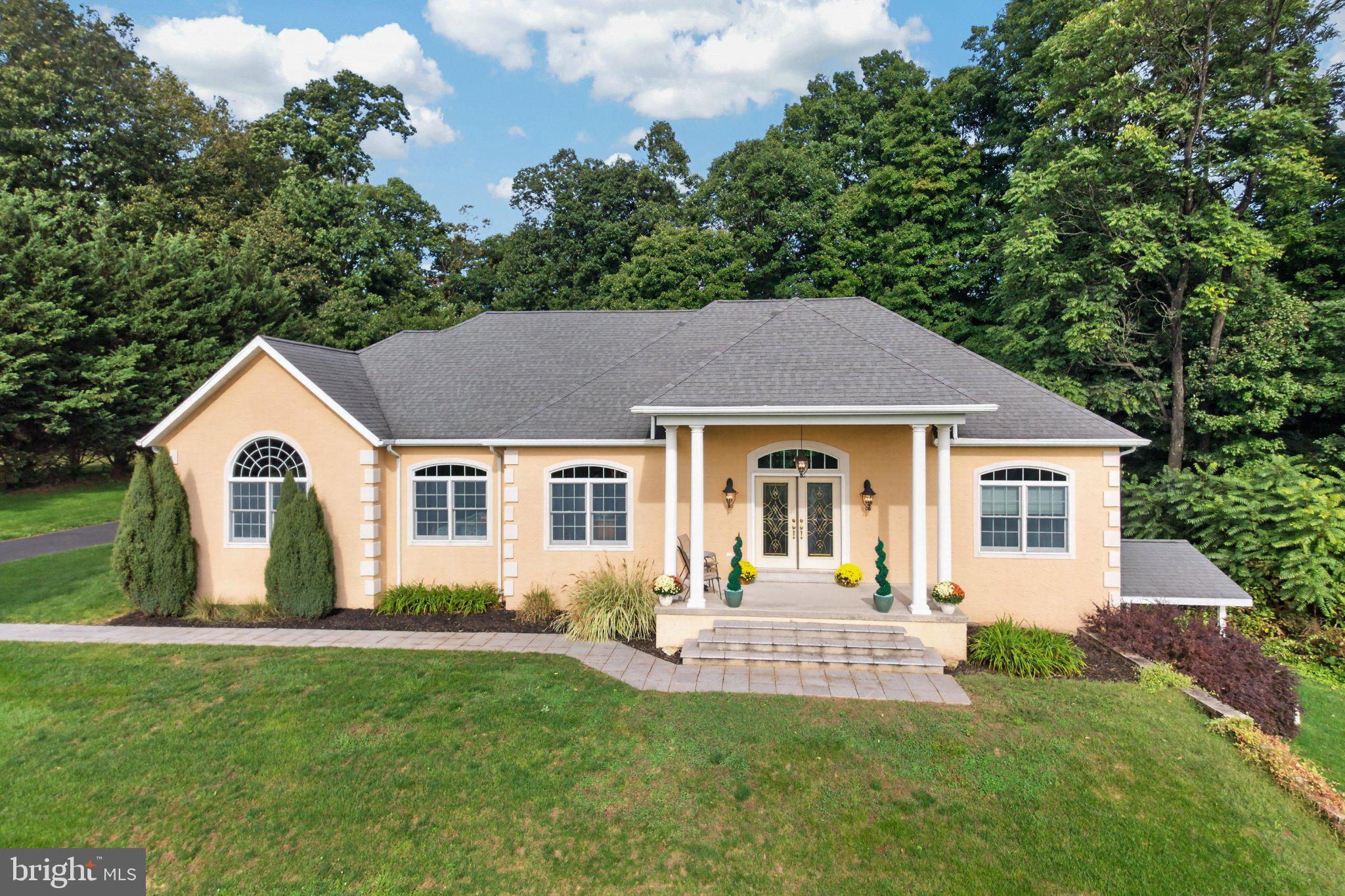 Enjoy the Stunning Views from this peaceful, elevated cul-de-sac. This beautiful Rancher offers a perfect blend of luxury and comfort, nestled on a sprawling 2.27-acre lot. Step inside to discover an inviting open & bright living area featuring ceramic tile and rich wood flooring that flows seamlessly throughout. The heart of the home boasts a cozy gas fireplace, perfect for intimate gatherings or quiet evenings. With three spacious bedrooms and two full bathrooms, this residence is designed for both relaxation and functionality. Relax in your primary suite featuring large windows with breathtaking views, complete with a remodeled bath. The spacious unfinished walk-out basement is ready for you to finish and make your own. Plumbing is already in place for a future kitchen and bathroom.  The property includes an attached garage and a heated detached 4 car garage, providing ample space for vehicles and hobbies. Step outside to a beautifully fenced-in backyard with patio, and enjoy the outdoors.