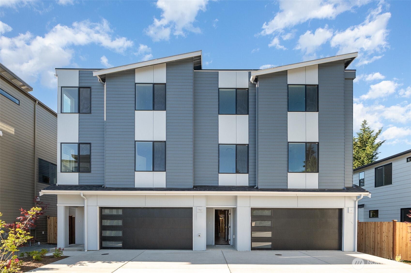 **Hurry: 4.5% Special Interest Rate with 2/1 Buydown!** Don't miss this spacious townhome with fenced backyard at Shelton Grove by MSR Communities. This 2,352 sq ft home in a premier cul-de-sac community offers 4 generous bedrooms, 3.5 baths, a main-level office, and a spacious rec room. The chef’s kitchen impresses with a walk-in pantry, premium sink with cup wash, quartz counters, and upgraded designer cabinetry. Luxurious features include smart mirrors in all bathrooms, a smart toilet in the primary suite, upgraded tile finishes, premium LVP flooring, EV charging, and a gas BBQ hookup on the balcony + too many upgrades. Nestled in a commuter-friendly location with access to top-rated Northshore Schools. GPS-24328 Carter Rd, Bothell