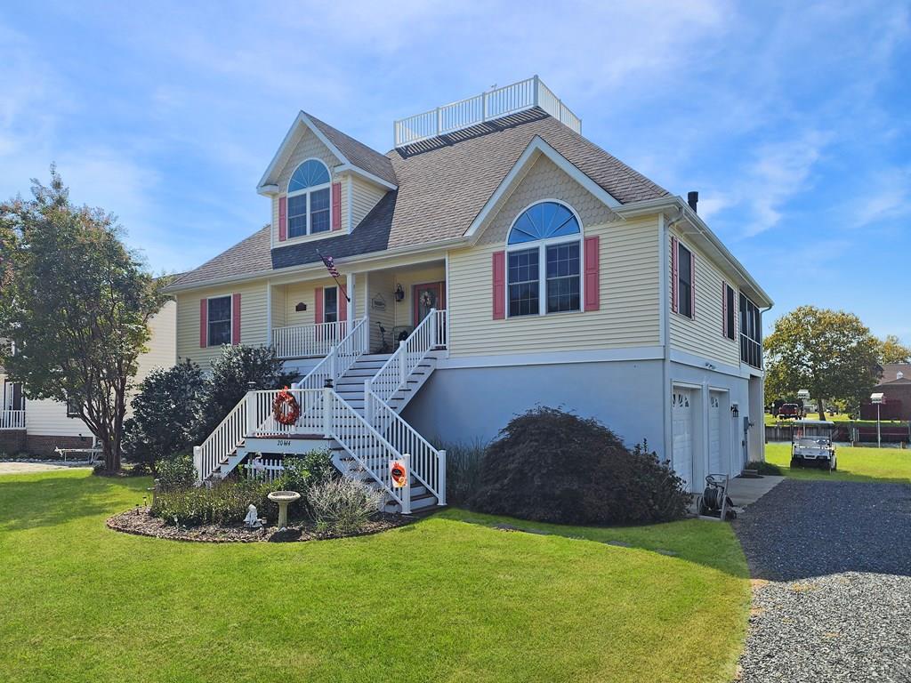 Exceptional waterfront dream home with quick access to the Chesapeake! Whether you are looking for a weekend escape from the city or a place to call your forever home, 20444 Baldpate Lane checks the box. The ground level is a substantial multi-car garage, utility room and workshop. The main living level features a great room with vaulted ceilings, large windows and gas fireplace. This level also features a spacious kitchen with gorgeous natural wood cabinets, granite counters and SS appliances. There are 2 well-appointed bedrooms, a full bathroom and a laundry room as well. Along the rear of the home, you enjoy your time on the screened porch that stretches the entire span of the house. The top floor is a massive primary suite with a walk-in closet, ensuite bathroom and waterside balcony.