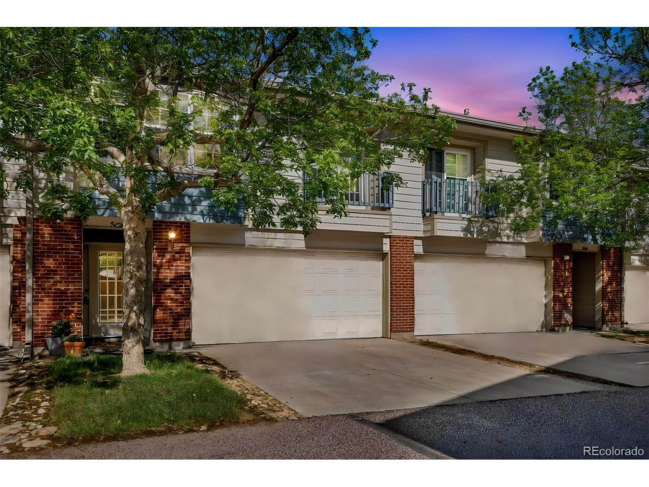 Beautifully designed two-story townhome in Orchard Vista Townhomes offering the perfect blend of comfort, functionality, and location. Featuring gorgeous hardwood floors and an open, light-filled layout, this home is enhanced by soaring ceilings and stunning windows that flood the space with incredible natural light throughout. The thoughtfully designed upper level features a spacious kitchen, dining area, cozy breakfast nook, and a large family room perfect for relaxing or entertaining. Upstairs, you'll find two spacious bedrooms with a layout that provides both comfort and privacy. On the main level, a non-conforming third bedroom offers excellent flexibility for guests, a home office, or workout space. You'll also find a bonus entertainment/family room that opens directly to the private backyard-creating the perfect setup for indoor/outdoor living, gatherings, or simply enjoying your own quiet outdoor retreat. An attached garage adds everyday convenience and additional storage. Ideally located near shops, restaurants, parks, trails, and everyday amenities, this home offers low-maintenance living in an incredibly convenient location.