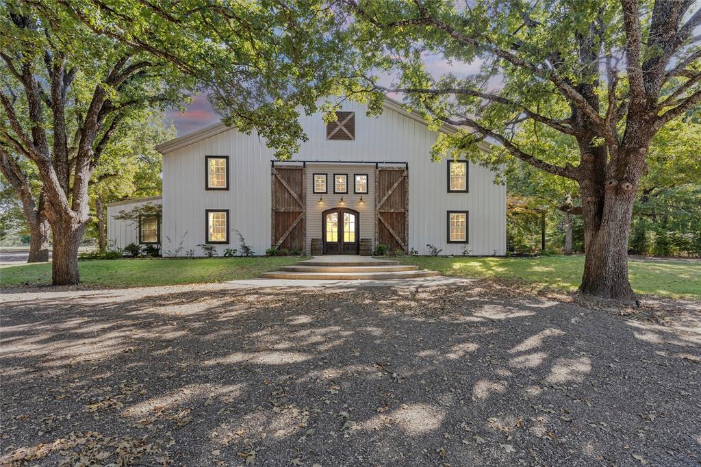 Under the Wildwood Events venue was custom built by a local family to serve others and be part of beginning new families.  Just 7 years old, the location has successfully had many events including parties and reunions, but mostly weddings.  The location and setting is very unique in part because of its reliably quiet location, easily drained sandy loam soil and excellent preserve for the lush green surroundings.  The location is well appointed for indoor and outdoor events with seating for both.  The indoor entertainment hall is greater than 6,700 SF with seating and tables for 250. The outdoor wedding area has permanent seating for 250, stone walk way to the alter, 825 SF covered patio attached and fire pit area.  We have a caterers kitchen that provides workspace, staging area, tables, refrigerator and multiple power outlets.  Broom and bride dressing rooms upstairs with a half bath in the brides room.  There are large his and her guest bathrooms downstairs.  The venue includes a 1,475 SF 2 BR 2 bath suite with kitchen and living area in an open floor plan.  There's a separate utility room, 2 car garage and huge storage area already decked above the garage.  The suite can be used for temporary guest, parsonage or permanent living area for the new owner.  There's also plenty of room outside to add multiple tiny homes to expand the rental possibilities for larger parties and reunions.  There's designated venue storage for decorations, PA system, lights and supplies.  The sandy soil at this venue drains well and is reliably dry.  The venue is reliably accessible and has never been rained out.  The possibilities are unlimited.  Come put your signature on this beautiful property.