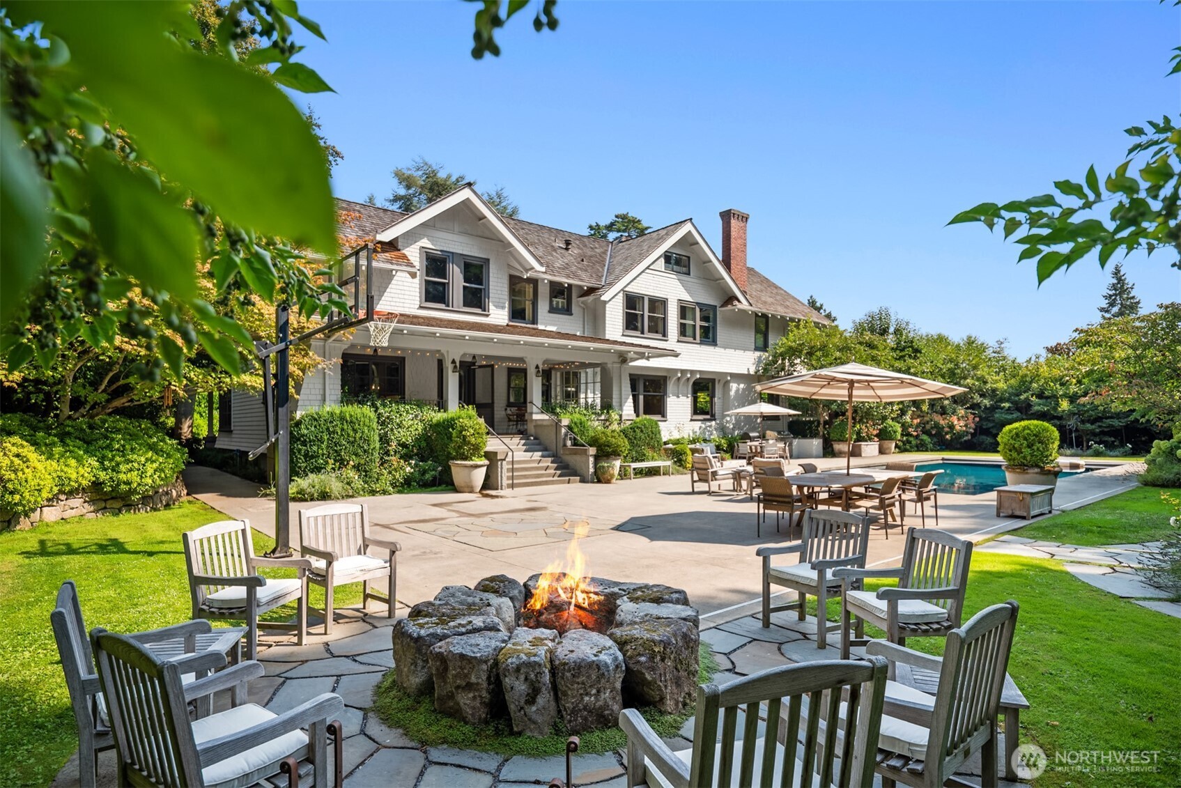 Before Medina became famous for 'who' lives on the Gold Coast, Edward Webster and his noted architects set the standard for 'how” when they built The Gables. Created for modern life with a conscious investment in quality, this uber private estate with Hamptons vibes commands .75 acres. Modernized and effectively rebuilt by Toth Construction, “Medina’s first great home” showcases magazine-worthy interiors by Rocky Rochon. Luxurious details and timeless materials set the scene for large affairs or intimate living. Grandeur unfolds in stages, from the motor court to deep porches, through lush gardens past the enchanting pool to the play lawn. Beautifully featured in print and on screen, this legacy property is a rare investment built to last.