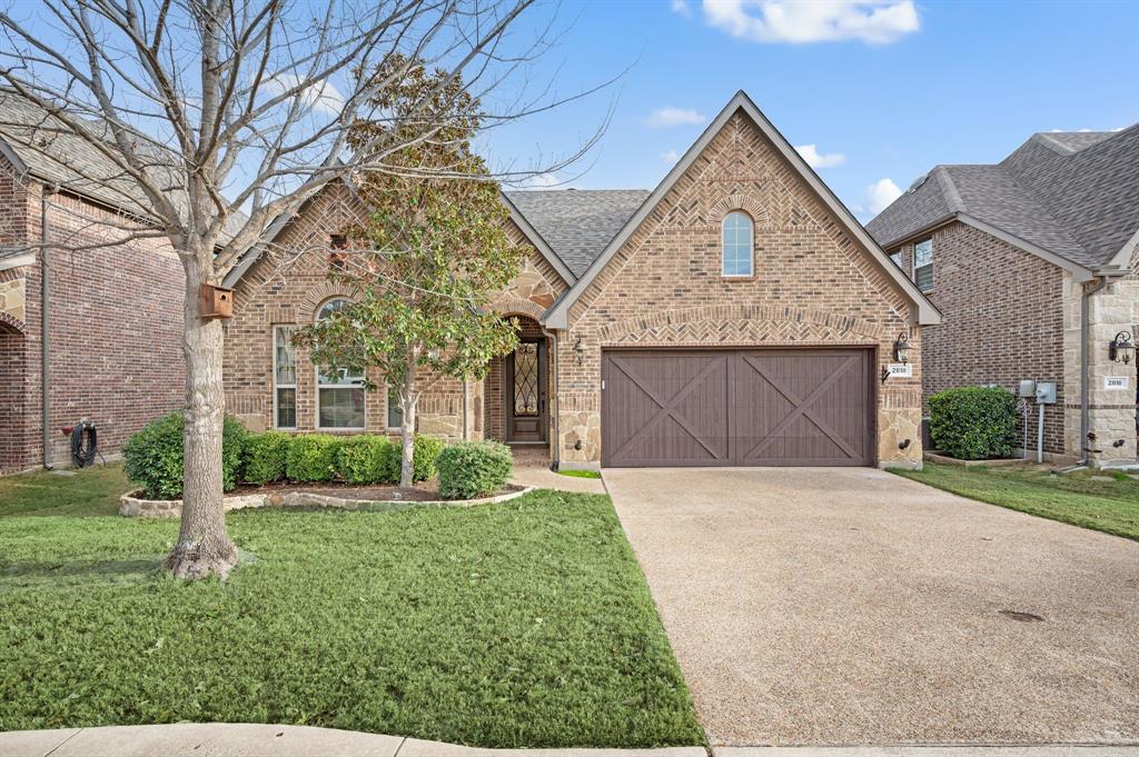 Gorgeous single-owner, one-story home featuring 3 bedrooms and 2.5 baths, nestled in the desirable Abbey Moor neighborhood of Trophy Club and backing to U.S. Army Corps of Engineers land for exceptional privacy. Step inside to a beautifully maintained home with a split-bedroom layout, offering both space and separation. The spacious primary suite is tucked away on one side of the home and features a generous ensuite bath, while the secondary bedrooms are thoughtfully positioned on the opposite side of the home with a shared full bath. The open-concept kitchen flows seamlessly into the living area, creating an inviting space ideal for everyday living and entertaining. Enjoy a peaceful backyard setting with an extended patio and no rear neighbors, while still offering easy access to Trophy Club’s exceptional amenities. Thoughtful landscaping includes black raspberry plants, producing fruit in both the spring and fall. Additional highlights include a roof replaced in 2024 and a gas dryer hookup located in the spacious utility room. Zoned to highly rated Northwest ISD schools, this well-maintained single-story home offers comfort, thoughtful design, and a prime location—an opportunity you don’t want to miss.