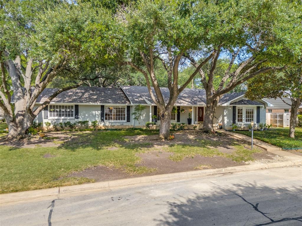 Welcome to 3816 Trails Edge Road, an elegant single-story ranch-style residence situated on a spacious corner lot in Overton Park, one of Fort Worth’s most desirable neighborhoods. Thoughtfully designed with comfort and functionality in mind, this 3-bedroom, 3.5-bathroom home offers a seamless blend of classic charm and modern updates, creating the perfect setting for both everyday living and entertaining. Step inside to find an inviting layout highlighted by hardwood floors and an open-concept kitchen and family room. The kitchen is a true centerpiece, boasting expansive counters, abundant cabinetry, and a layout that flows effortlessly into the family room, making it ideal for gatherings of all sizes. For more formal occasions, the home also features a sophisticated living room and dining room, perfect for hosting special celebrations and holidays. The private owner’s retreat is a true sanctuary, complete with a generous sitting area, an oversized walk-in closet, and direct access to the backyard and pool. The spa-like primary bathroom offers a peaceful escape with dual vanities, a soaking tub, and a separate shower. The additional bedrooms are spacious, offering comfort and privacy for family and guests alike, while the dedicated powder bath adds convenience for visitors. Outdoors, a sparkling pool anchors the backyard oasis, providing the perfect place to cool off on warm Texas days or entertain under the stars. The large corner lot offers extra space, privacy, and curb appeal, enhancing the property’s sense of retreat. Located in the heart of Fort Worth and within walking distance of Tanglewood Park, this home offers close proximity to premier schools, shopping, dining, and the vibrant cultural district, all while being tucked away in a quiet, established community. With its thoughtful updates, spacious layout, and unbeatable setting, 3816 Trails Edge Road is a rare opportunity to enjoy timeless style and modern living in one of the city’s most coveted areas.