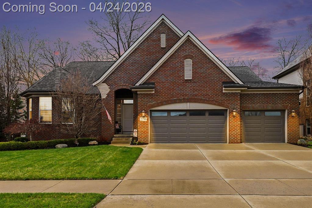 This stunning 3-bedroom, 2.5-bath ranch offers over 2,400 sq ft of beautifully finished living space with high-end finishes throughout. The open layout features engineered flooring, granite in the kitchen and baths, and a chef-inspired kitchen with a large island, premium cabinetry, and designer backsplash.The vaulted family room showcases dimensional beams and a striking two-way indoor/outdoor fireplace, seamlessly connecting to the outdoor living space. A bay-window study is perfect for working from home, while the extended owner's suite adds comfort and privacy.The finished basement includes an impressive 36' x 33' workout or recreation area. Additional highlights include ceiling fans in all bedrooms and a 3-car garage.Outside features professional landscaping, sprinkler system, aluminum fencing, new sod, gutter guards, and a built-in dog door. Move-in ready!