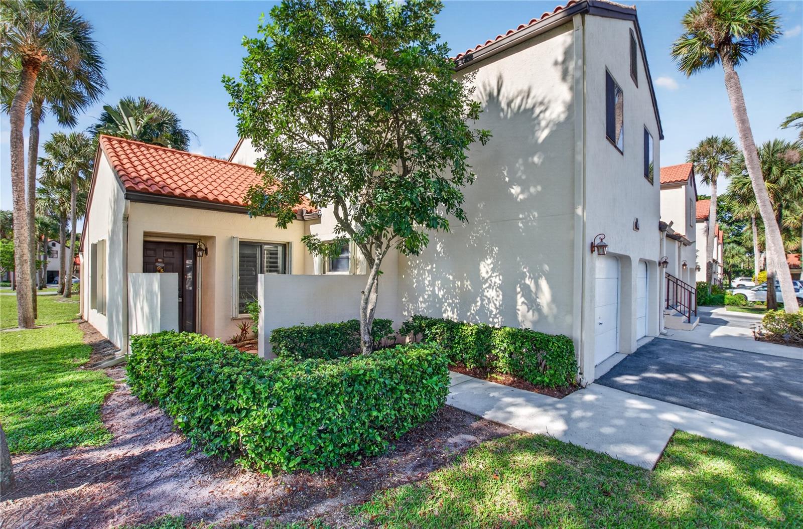Discover the ease of South Florida living in this beautifully updated 2-bedroom, 2-bath first-floor condo on a corner lot in a gated Boynton Beach community. Imagine starting your morning with coffee on your brand-new screened patio, enjoying a swim or workout just across the street at the community clubhouse, and spending your days exploring nearby shopping, dining, parks, and beautiful beaches. With resort-style amenities close to home and the ease of low-maintenance living, this inviting condo offers a wonderful opportunity to enjoy the comfort and relaxed lifestyle that make South Florida so appealing.Inside, natural light fills the home through new high-impact windows, complementing the fresh paint and modern finishes throughout. The updated kitchen features quartz countertops, newer appliances, and additional cabinetry for enhanced storage and functionality. The primary suite includes an updated bathroom with a walk-in shower, while plantation shutters add timeless appeal. Additional updates include a brand-new water heater, an approximately one-year-old interior A/C air handler, and an exterior A/C unit approximately 5 to 7 years old.The community clubhouse is directly across the street and features a swimming pool, fitness center, sauna, and tennis courts. The HOA office is also conveniently located nearby, adding to the community's practical appeal.For buyers considering an investment opportunity, the property is advertised with a cap rate, subject to verification of rental income and operating expenses. The association requires a minimum 12-month lease. Proposed HOA dues reductions were discussed at a recent board meeting, with additional reductions anticipated in 2028 and 2029, subject to approval. Buyers should verify the cap rate, rental restrictions, current dues, and proposed budget directly with the association.