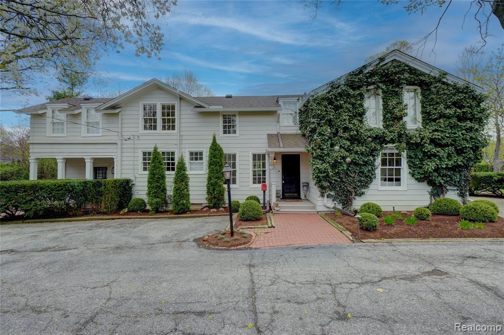 A truly rare opportunity to own one of Birmingham’s most treasured historic homes, the iconic Watkins Pony Farm, where the charm of 1860 architecture meets the luxury of a meticulous modern-day renovation. An inviting foyer welcomes you into a stylish large living room with fireplace, flowing seamlessly into the enchanting three season porch overlooking a LARGE private, arborvitae lined yard filled with lush gardens and mature landscaping. The home offers an elegant dining room perfect for entertaining, along with a cozy family room featuring an additional fireplace and a sunlit mudroom and laundry area just off the kitchen.A stunning floating curved staircase leads to a spacious second level with four bedrooms and three beautifully appointed baths, preserving vintage character while offering today’s comfort. What makes this home truly exceptional is the current owner’s comprehensive, design-forward renovation, executed with extraordinary care and attention to detail. Additional highlights include a rare 3+ car garage, a garden shed, a short walk to downtown Birmingham, and an unbeatable location.