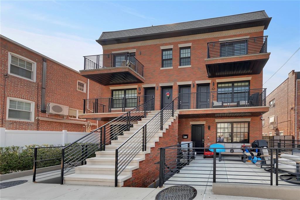 Welcome to 101 Battery Avenue #2A, a spacious three bedroom, two bathroom condo in The Battery Avenue Condominium, a boutique six unit building in the Fort Hamilton section of Bay Ridge.Built in 2018, this newer construction home offers approximately 1,350 square feet of well laid out interior space, two private outdoor areas, a deeded parking spot, and private basement storage. The home opens into a bright living and dining area with gray oak floors, recessed LED lighting, oversized windows, a whitewashed brick accent wall, and a built in window seat with flanking bookshelves.At the center of the home is a modern kitchen with a large quartz waterfall island with seating, stainless steel appliances, a marble backsplash, and generous cabinet space. The kitchen opens directly to the living and dining area, giving the main level an open, connected feel.All three bedrooms are well proportioned, with the primary bedroom offering an en suite marble bath and sliding glass doors to its own private rear balcony. The home also features central air and heat, a laundry closet with washer and dryer hookup, and large windows throughout, some with a partial view of the Verrazzano-Narrows Bridge. Private outdoor space bookends the home, with a covered front porch off the entry and the rear balcony off the primary bedroom.Set in one of Bay Ridge's most established residential pockets, 101 Battery Avenue is close to John Paul Jones Park, the Shore Road promenade, waterfront parks, and Dyker Beach Golf Course, along with the neighborhood restaurants, cafes, bakeries, and shops of Third and Fifth Avenues. Commuting is convenient, with the R train along Fourth Avenue, express bus service into Manhattan, and major roadways all nearby.
