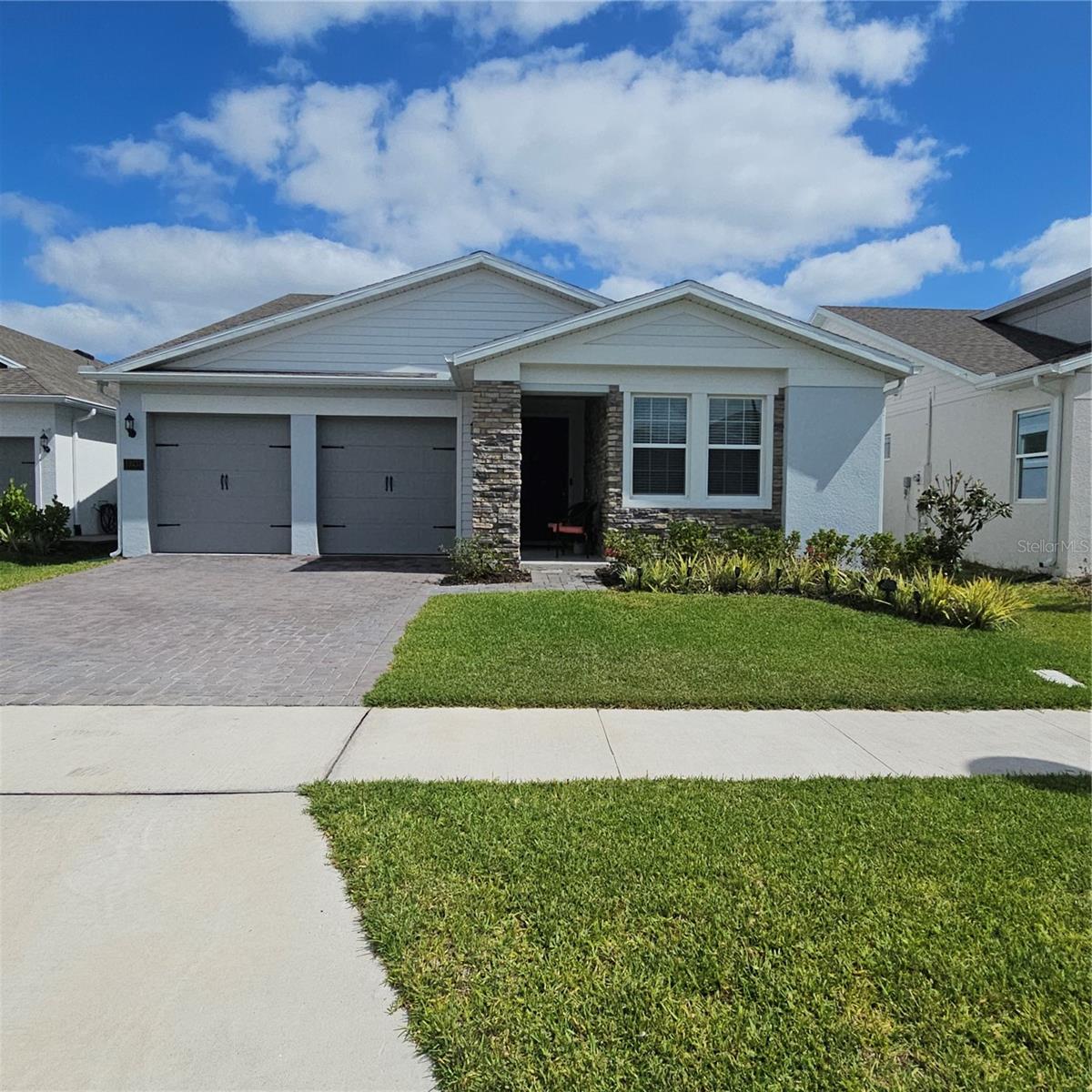 **PRICE REDUCED**Come and see this stunning 3-bedroom, 2-bathroom home in the Summerdale Park at Lake Nona—a comfort and modern living. This open floor plan creates a welcoming atmosphere, leading to a spacious kitchen that boasts an oversized island, stainless steel appliances including a refrigerator stovetop that adds a touch of elegance. Adjacent to the kitchen is a convenient laundry room equipped with a washer and dryer. The master bedroom is generously sized, featuring two walk-in closets. The luxurious master bathroom offers dual vanities with sinks, a dual shower with rain/waterfall shower heads, and a separate garden tub. Each additional bedroom is providing ample space and natural light. Features a 2-plus car garage with a storage area and a dedicated mud/storage room off the garage entry. An opportunity to relocate to the highly sought-after Lake Nona area. Access to community amenities, including a walk to the community pool with a pond view and green space. Easy access to Lake Nona shopping centers, restaurants, and vibrant entertainment options. Driving minutes to the International Airport, Lake Nona Medical City, and conveniently located near Orlando’s major highways. Live in one of the best school districts in Florida with A+ ratings for all grades K-12. Lake Nona is one of the newest neighborhood communities. Be minutes away from great dining, shopping, family friendly parks and many more amenities! Every room comes equipped for Ethernet connection allowing you to have high-speed internet. The outdoor backyard connections ready for BBQ. Tour today before it's gone...