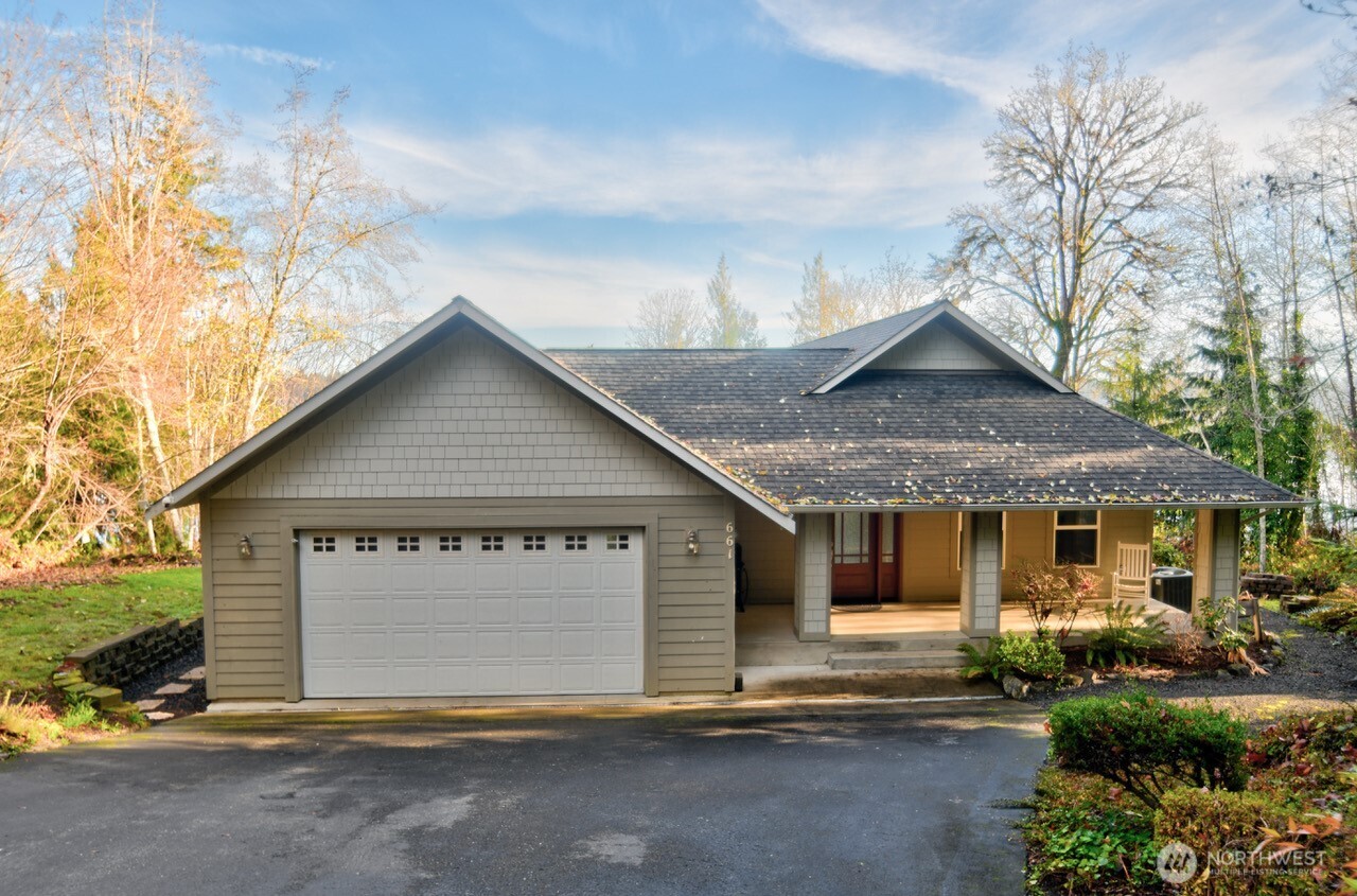 Your serene waterfront sanctuary awaits you on Totten Inlet where home feels like a permanent vacation! Path on property leads to 160’ of private beachfront & 200’ of tidelands. Kayak, swim, fish, harvest oysters & clams from your own beach. This lovely 2,430 sf, 2 BR + den home features an open light filled concept design, cook's kitchen w/large island, quartz counters, stainless steel appliances & pantry, dining & living room w/floor to ceiling windows to enjoy the amazing view & French doors leading out to view deck – perfect for entertaining; whole house water filter system. Wake up to the fabulous view from the primary bedroom, w/spa like ensuite bath w/jetted tub & shower. Garage has a pass through to patio. Must see to appreciate!