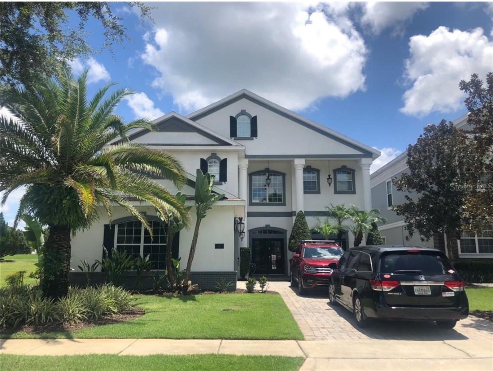 Phenomenal TURN -KEY opportunity located in the Homestead Subdivision on Reunion’s East Side.  Nestled up the INDEPENDENCE GOLF COURSE with a great view, this home is a PROVEN Rental Winner.  It comes FULLY FURNISHED with a TRANSFERRABLE MEMBERSHIP.

As you walk into this home you are greeted by natural light and an open concept layout. Your living space is simply perfect for the family vacation with an open floor plan, allowing the entire family to cook, dine and hang out. You will love the massive kitchen with beautiful granite countertops. Experience the magic in the evenings and watch a  movie with the 75-Inch, 4K TV. Enjoy the comfy sectionals that seat 8 and beautiful dining area that comfortably seats 10. The home also offers SONOS sound system inside and out.

Escape everyday life and make magical memories in this spectacular 4,192 Sq. Ft, 5 bed, 4.5 bath home. No expense has been spared with this designed for fun, family vacation rental and has proven numbers to be a great Rental Income driven home. 
The arcade room features 2 Superbikes 2, Skeeball, Multi-Arcade, basketball arcade, and 5 arcades, Pac Man, Asteroids, Street Fighter, Centerpede & Rampage, a 120-Inch theater screen connected to upgraded cable, an Apple TV 2 with theater seating and karaoke set-up.  It also features Custom built full-size bunk beds and a Car Pool table, a New York theme scape with working lights .

This home is truly magical with beautiful interior furnishings and custom themed rooms for the entire family. Looking to experience that dream vacation only a few miles away from Walt Disney World® Resort? Well look no further as this home is simply perfect for you and your family.

Step out onto your private lanai, grill up a great lunch with the BBQ and enjoy your meal at your outdoor patio table that seats 8. Relax in the large pool and spa and take in the Florida sun on any of the 6 sun loungers. There is a pool alarm as well as an optional pool fence and self-closing gate for your peace of mind if traveling with little ones. For your convenience, you will find an outdoor poolside bathroom and shower. For fun, you will also find pool basketball, giant Jenga and 4-in-a row game.

Want to play??  Enter the game room, boasting 2 Superbikes 2, skeeball, 5 other arcades, and a basketball arcade. Want the kids to watch their own movie or play on a PS4 or Xbox One? Then they can do so in the game room with a 150-screen, upgraded cable, Apple TV 2 and theater seating for 8 and bar seating for 4. There is also a karaoke set-up for fun-filled evenings.
 
The ground floor Master bedroom has a King-size bed. Upstairs there is an open den which has a bar and cocktail table multi-arcade. There is also access onto the rear balcony. On the large rear balcony, you will find great views as well as lounge seating for 4.  Come see this fantastic opportunity to own a piece of Reunion!