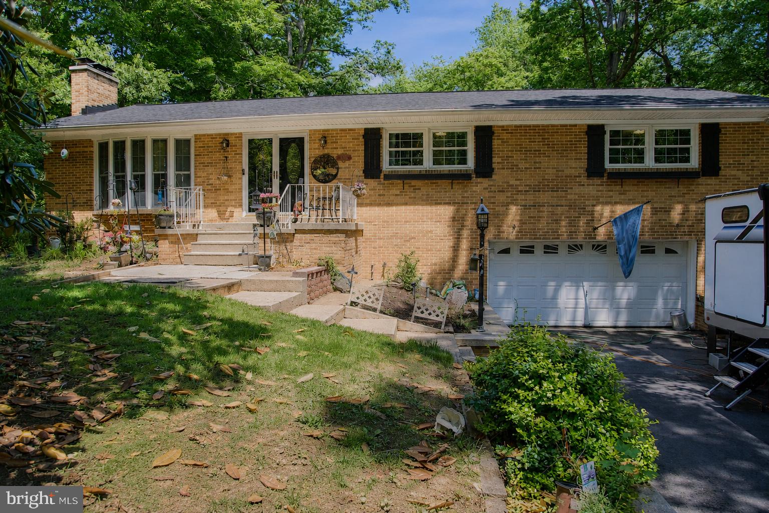 Almost an acre of land this is a custom built brick rambler located at the end of a quite street.  No HOA, covenants or restrictions;  Property has some fenced area and another fenced area on property.  4 Bedrooms and 2 full baths, large living room with bay window, dining rom, eat in kitchen.  Sunroom with deck attached, Most of the basement is finished with laundry room and storage area,  2 car garage.
