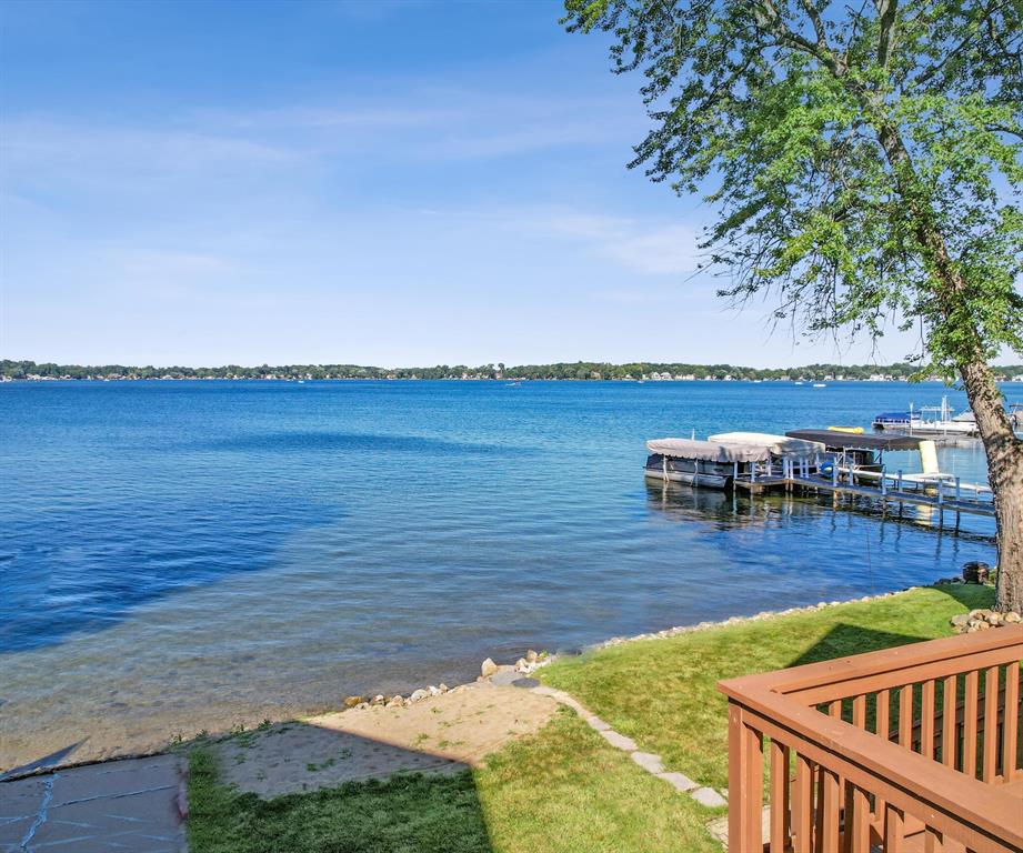 The BENEFIT of this Whitmore Lake Waterfront Treasure...The BENEFIT of this Whitmore Lake Waterfront Treasure - Updated Improved Well-Maintained Historic Home... Located in Whitmore Lake, this home offers direct private all sports lake access with panoramic views of Whitmore Lake. Situated on an excellent lot with easternly views, sandy beach, and walkable to downtown Whitmore Lake, this home offers everything you desire in a lakefront living.  3 bedrooms (one is situated in a way that offers a very private master suite, quest, or in-law quarters), 3 Full Baths, walkout basement, attached garage with service door, driveway allows spaces for at least 3 more vehicles, large deck spanning entire width of home, patio, extra parking pad, and so much more.  The updated craftsman like finishes provide a warm cozy feel to the already comfort of lakefront living.  Originally 100-year-old plush hardwood flooring is in impeccable condition and complemented by the many updates and improvements.  All appliances included, newer Lennox furnace with Wi-Fi controls, and multiple A/C units for zoned comfort.  You will be able to move right in and start enjoying the much sought after lake life. The serenity of the water and sunrise views from many rooms throughout the home, yet easy access to highways for elegant dinners out.  Whether in downtown Ann Arbor or Brighton, these nearby areas are just 10 minutes away.  Do you like to entertain?  Nothing like a party on the lake.  Be the place to celebrate all occasions; birthdays, holidays, University of Michigan Games, Tigers, Lions, Redwings, Pistons and more.  Whether you plan to live the lake life year-round, enjoy your up north cottage yet only minutes away, or use the house as an investment property, this is the perfect property for any option.  While the super clear spring fed all sports lake is outstanding during the warmer months, Whitmore is also great during the winter months where you can enjoy skating, organized hockey, ice fishing and more.  You have found a rare opportuni
