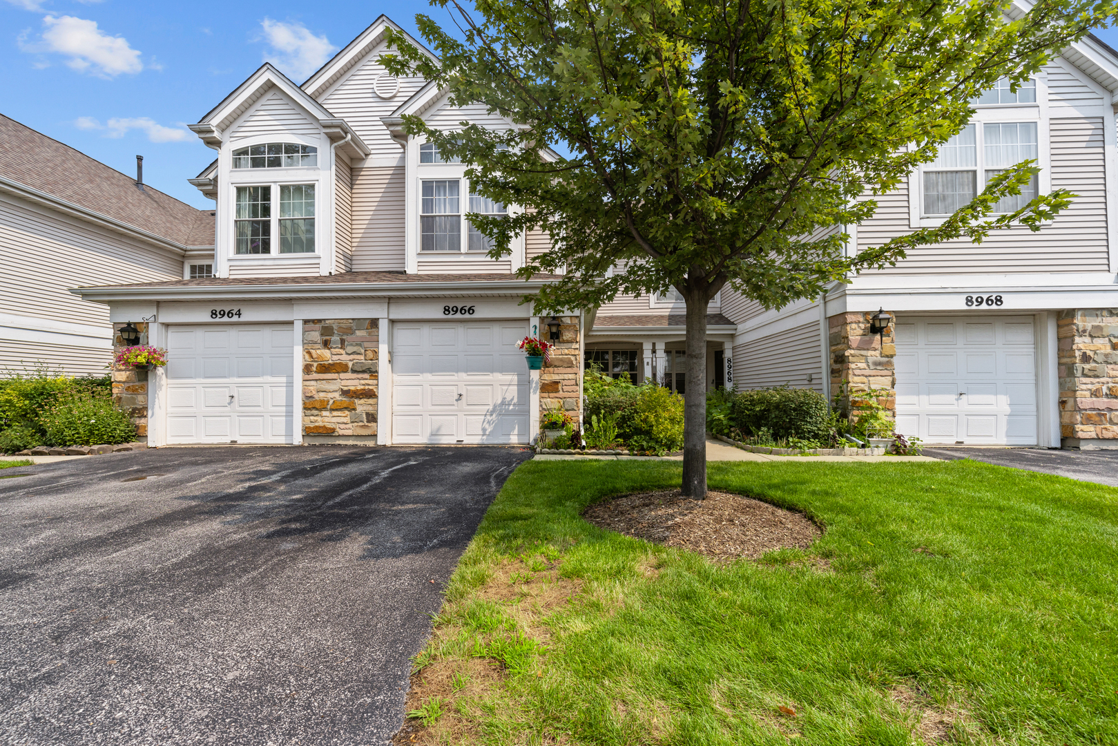 Welcome to the two-level townhouse with the full water views. There are 3 bedrooms and 2.5 bathrooms. The main level has a living room, dining area and a kitchen. The living room has a cozy fireplace and sliding door to a private patio, where you can enjoy the peaceful pond views and a quiet setting from your private backyard. The patio is perfect for relaxing, looking at the pond, fountain, geese and ducks. Kitchen has updated cabinets, granite countertops, window and a breakfast area. Also, there is walking closet and a powder room on the first floor. First level has hardwood floor in living room, dining room and the hallway. The second level offers three generously sized bedrooms and two full bathrooms. The primary suite has cathedral ceiling, walk-in closet and it's own full bathroom. All bathrooms have been updated with modern tile, vanities and fixtures. Landry is on the second floor. The attached one-car garage adds an extra convenience. There is also plenty of guest parking available right in front of the unit. Property is located 1,5 miles from Hwy-294, close to the ground transportation and just few minutes walk to the free Niles bus. This is a water-front living at its finest. Don't miss this rare opportunity to call it home!!!