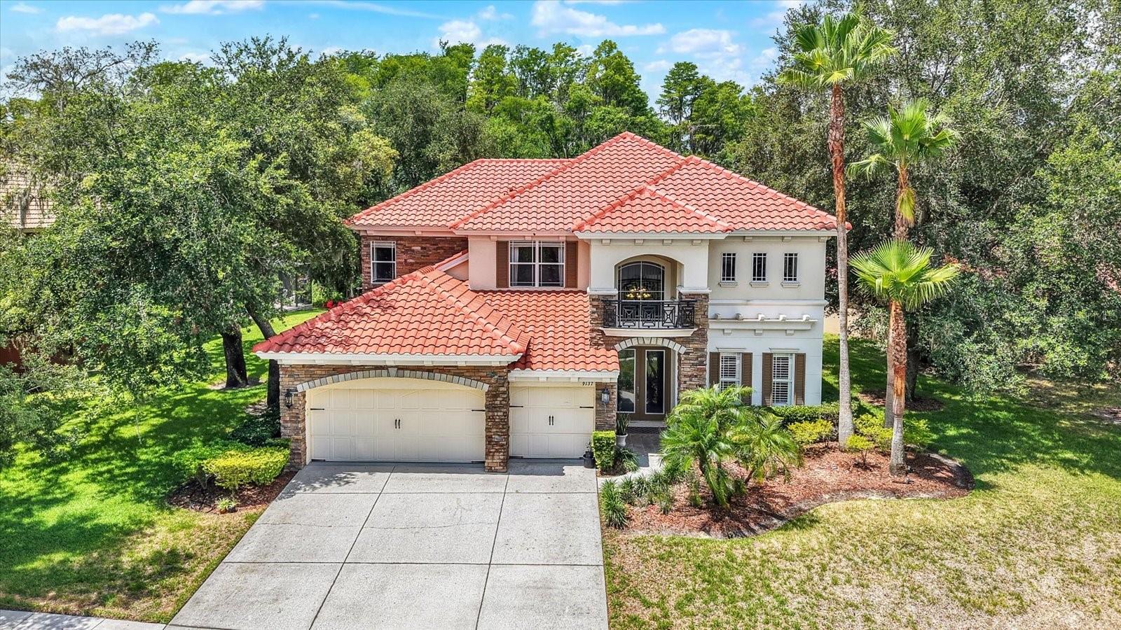 Dive into the ultimate Florida lifestyle with this spectacular pool home—featuring a NEW ROOF (Installed 2026) and two newer HVAC systems (installed in 2024 and 2025)—located in the highly sought-after, gated community of Waters Edge! Designed to make an instant statement, the private backyard oasis features a pristine, heated swimming pool with a convenient outdoor half bath and absolute privacy with no rear neighbors. Additional recent interior upgrades include a newly tiled primary bath, custom walk-in closets, and modern LED lighting. While not directly on the water, this residence gives you full access to a vibrant lakefront lifestyle, including the exclusive community boat ramp, clubhouse, and playground located a short walk away. Inside, the spacious layout features 5 bedrooms, a dedicated office, 3 full baths, and 2 half baths. The main-floor primary suite provides a quiet retreat with a sitting area, while the massive fifth bedroom upstairs serves as a perfect game or media room. An open-concept kitchen overlooks the family room, keeping your focus entirely on those beautiful pool views. This exceptional property offers seamless access to local shopping, dining, historic downtown attractions, and area golf courses. Your private paradise is ready for its next owner.