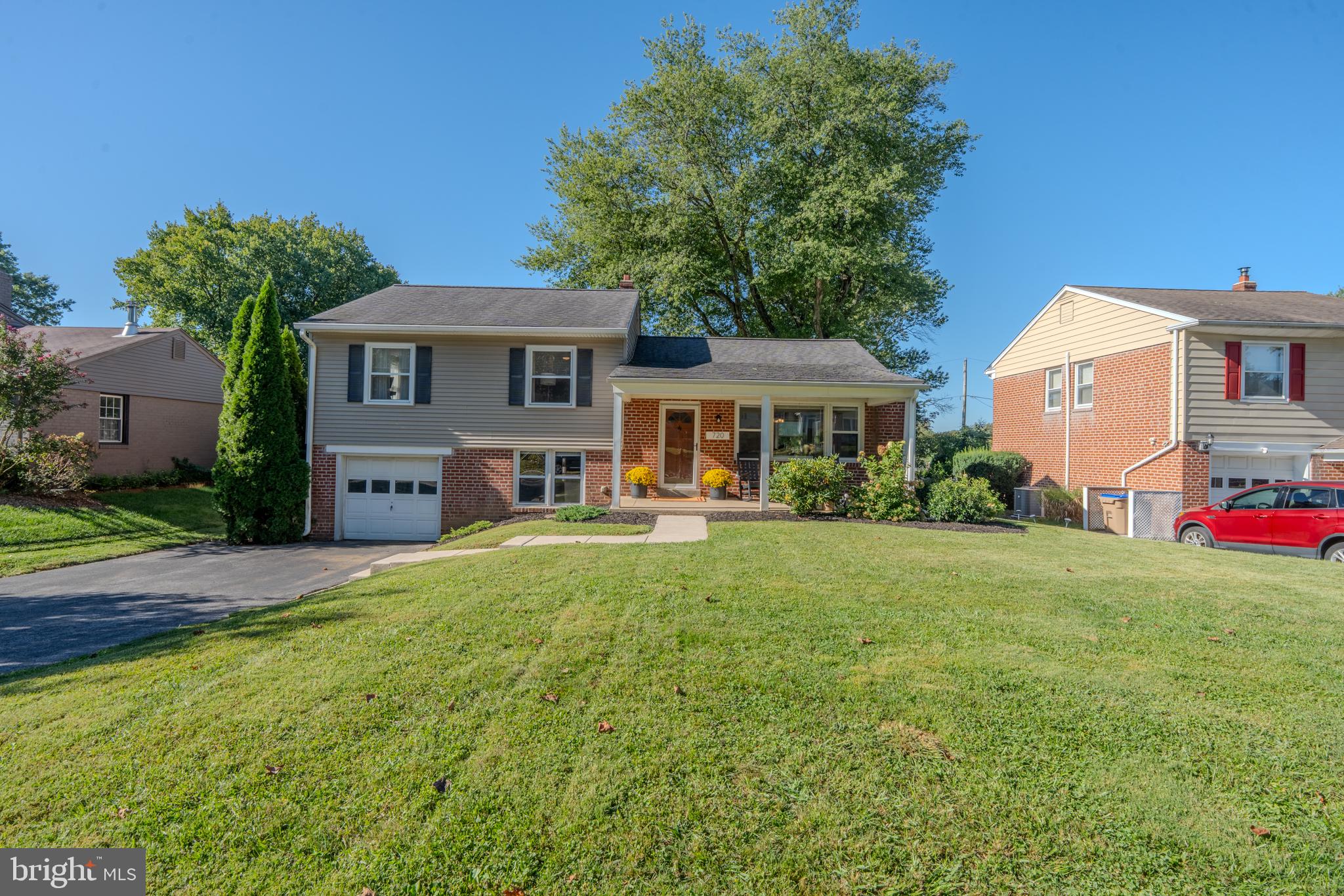 Such a good one!  Welcome to 720 Wisteria Dr, located in a perfectly centralized location of Newtown Square.  This home has been loved by it's owners and is truly move-in ready!  Pull up and fall in love with the street and the curb appeal of the home!  The large private driveway and open front porch welcome you.  The main level of the home has a great circular flow with a large living room with bay window, a large dining room and an eat-in kitchen.  The oak hardwood floors are in gorgeous condition!  The lower level (but above grade) offers a great additional living space, powder room and separate laundry/utility room with access to the backyard.  upstairs you will find 3 nicely sized bedrooms including a primary with an attached deck.  The fresh paint throughout makes a nice, easy palette to work with.  The outdoor space at this home is wonderful.  An open front porch, a deck off the primary upstairs, a partially covered patio out back and a huge fully fenced back yard make this property truly enjoyable.  This home has tons of natural light throughout, has a happy feeling the moment you walk in and is ready to go for it's next owner.  Book your appointment today.