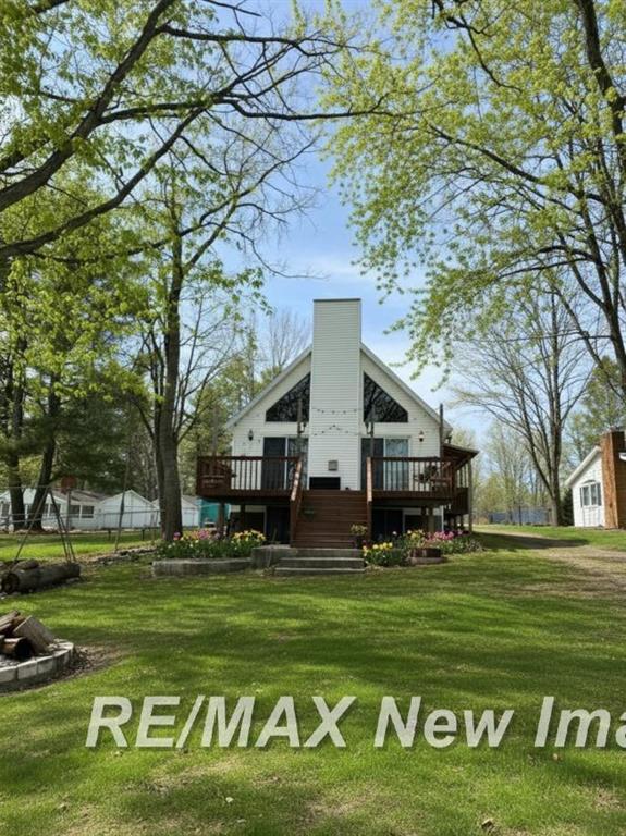 Get yourself a cabin on Wixom before the lake fills up and prices jump!!  This place offers 3 bedrooms, 2.5 bathrooms, a nice deck with great views.  There is a large outbuilding for all of your summer and winter toys.  The main road is set to be paved this year once the frost laws are removed.