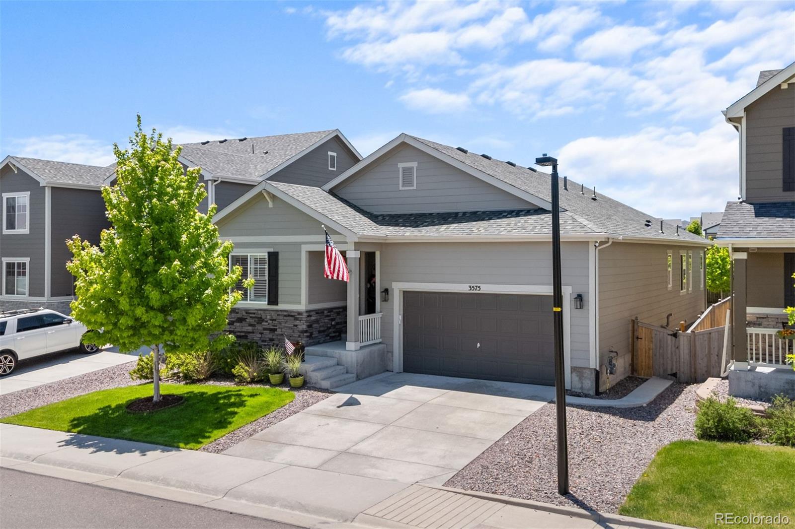 Where you live should make life feel easier—and this modern ranch-style home delivers. Clean lines, natural light, and calm functionality define the layout, from the open-concept great room to the gourmet kitchen with smart appliances and a generous island. Dual sliding doors lead to a private backyard and peaceful patio—perfect for slow mornings, casual dinners, or spontaneous gatherings. Despite the road just beyond, it’s remarkably quiet and surprisingly secluded.

Five bedrooms across two finished levels offer space to grow, host, or unwind. The main-floor primary suite is luxurious, complete with a barn door entry to a five-piece bath and walk-in closet. Additional bedrooms flex easily for work, fitness, or guests, while the finished basement adds a large recreation room, two more bedrooms, and bonus storage. With trails, parks, pools, and schools just around the corner, this home is grounded in real life—comfortable, capable, and quietly impressive.