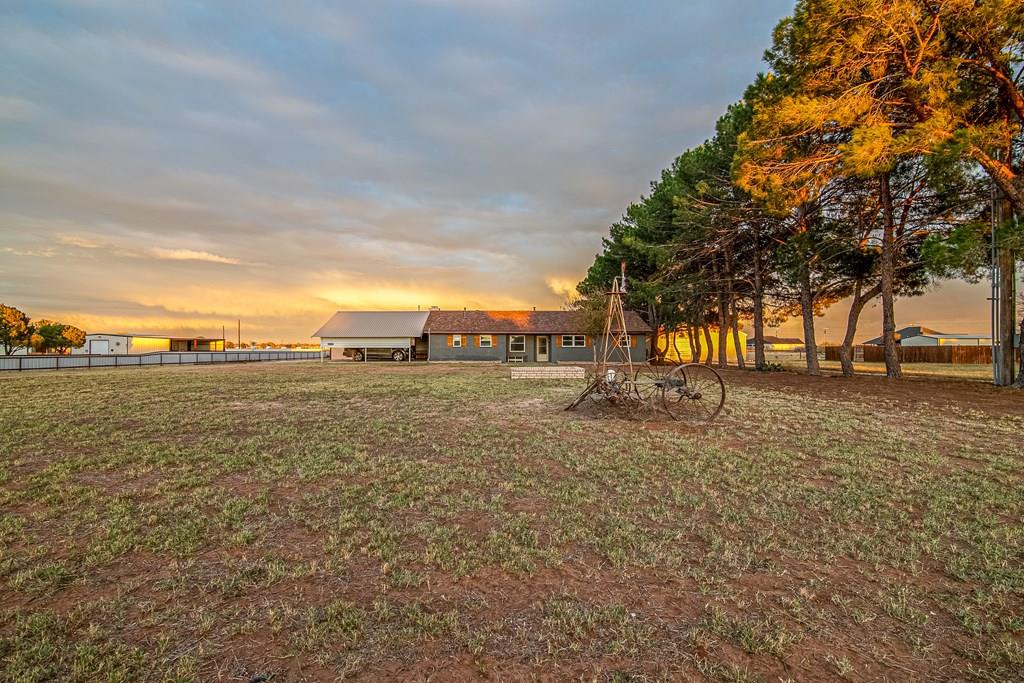 Experience refined living on 1.85 unrestricted acres in sought-after Greenwood ISD. This beautifully updated 3-bed, 2-bath home features freshly repainted kitchen and dining cabinets, a brand new HVAC, new water heater, and new 200-amp service. The property offers three water wells, new solar lights in the backyard, and a dry pond/pool. A standout 3050 shop with upgraded electrical and two full RV hookups add exceptional convenience. A rare blend of luxury, space, and versatility—schedule your private tour today!