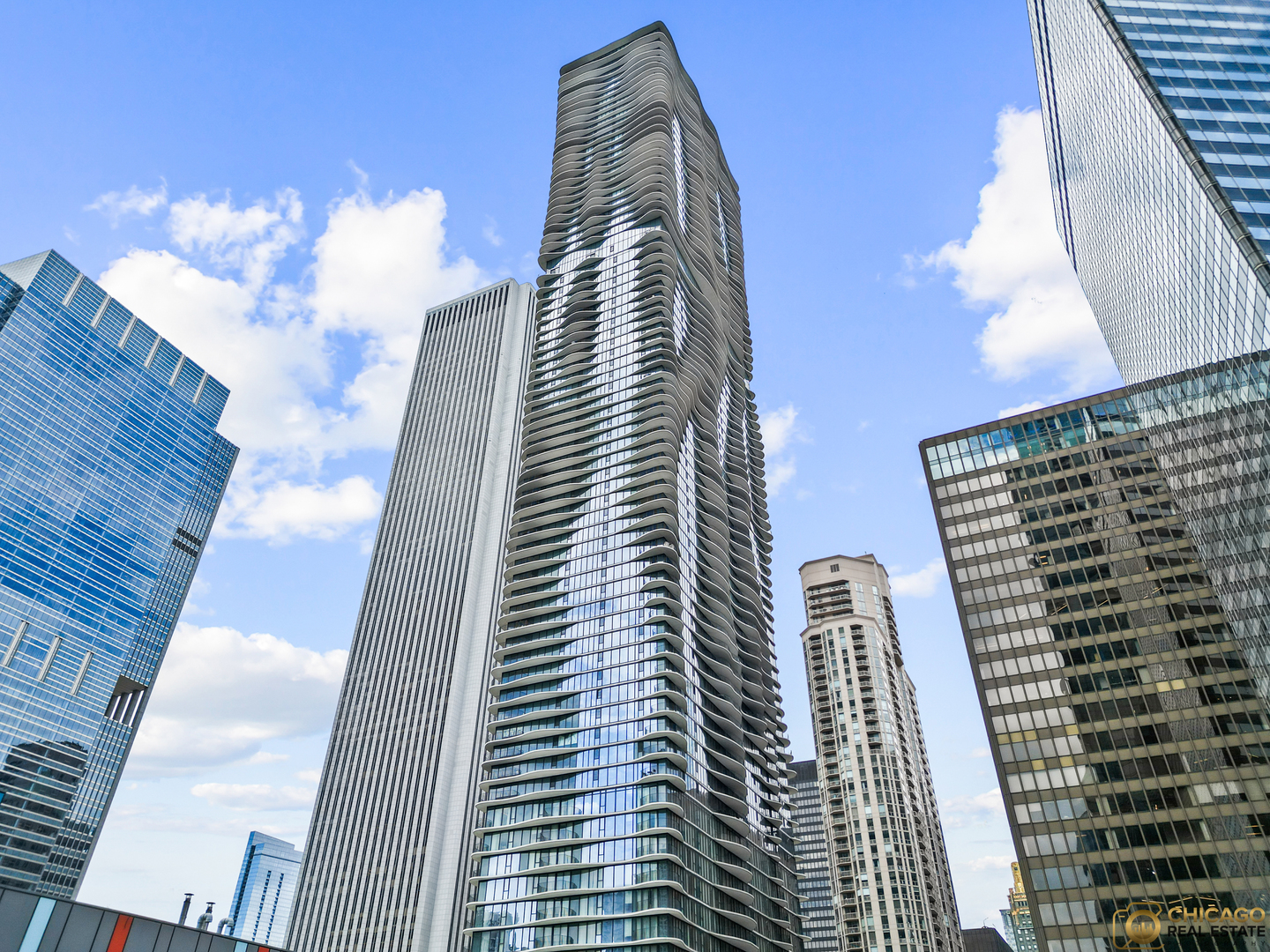 AQUA! Your clients will love this gorgeous, light filled home. With floor to ceiling windows and stunning views of the lake and city. Unique to most Chicago high rise buildings, Aqua features a four pipe heating and a/c units which allows both heat and a/c to be run at the same time! Beautifully appointed with tons of upgrades, including: wide maple plank floors, Lightology lighting, custom Italian cabinets and ceramic backslash, panel doors, Hunter Douglas electric shades, Closetworks custom closet organizers, multi-head shower in master bath and all in immaculate condition at a great price - including parking! Soaring 81 stories, Aqua has the best resort like amenities in town: 1 indoor pool and 1 outdoor pool, 2 whirlpools, cabanas, huge fitness center, yoga studio, steam and sauna rooms, private theater, billiard and poker room, business center and more!