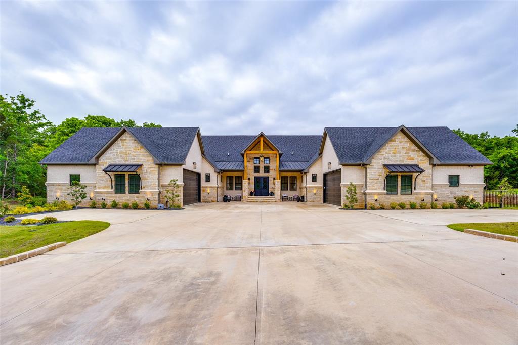 urnkey Lakefront Retreat at Rock Creek Resort on Lake Texoma. Situated on a premier double lot backing to protected Corps of Engineers land, this custom-built home offers exceptional privacy, unobstructed natural views, and the peace of mind that the landscape behind you will remain untouched.Designed for entertaining, the home features 5 bedrooms, 3 full baths, and an incredible bunk room with four full beds and built in reading lamps, providing ample space for family and guests. The spacious primary suite serves as a private retreat with direct patio access and a luxurious spa-inspired wet room featuring a glass-enclosed steam shower and sauna, oversized rain head, and separate Jacuzzi soaking tub.The expansive game room is built for gathering, complete with a built-in bar, TV lounge area, and plenty of space for gaming tables and activities. Soaring beamed ceilings, Taj Mahal stone finishes, and two fireplaces add warmth and character throughout the home.Outdoor living takes center stage with a massive covered back porch featuring a fireplace, built-in grill, flat top grill, sink, TV, and motorized shades, creating the ultimate space for entertaining. A separate fire pit gathering area provides the perfect setting for evenings under the stars. The oversized double lot offers ample room to add a future resort-style pool.Two oversized two-car garages with attic storage provide abundant space for boats, golf carts, and lake toys. Residents enjoy gated security, a Jack Nicklaus-designed golf course, clubhouse amenities, and one of the most sought-after lifestyles on Lake Texoma.Why spend years designing, building, and furnishing a lake house when this one is ready to enjoy today? Thoughtfully designed, beautifully finished, and completely move-in ready, this is a rare opportunity to skip the construction process and start making memories at the lake immediately.