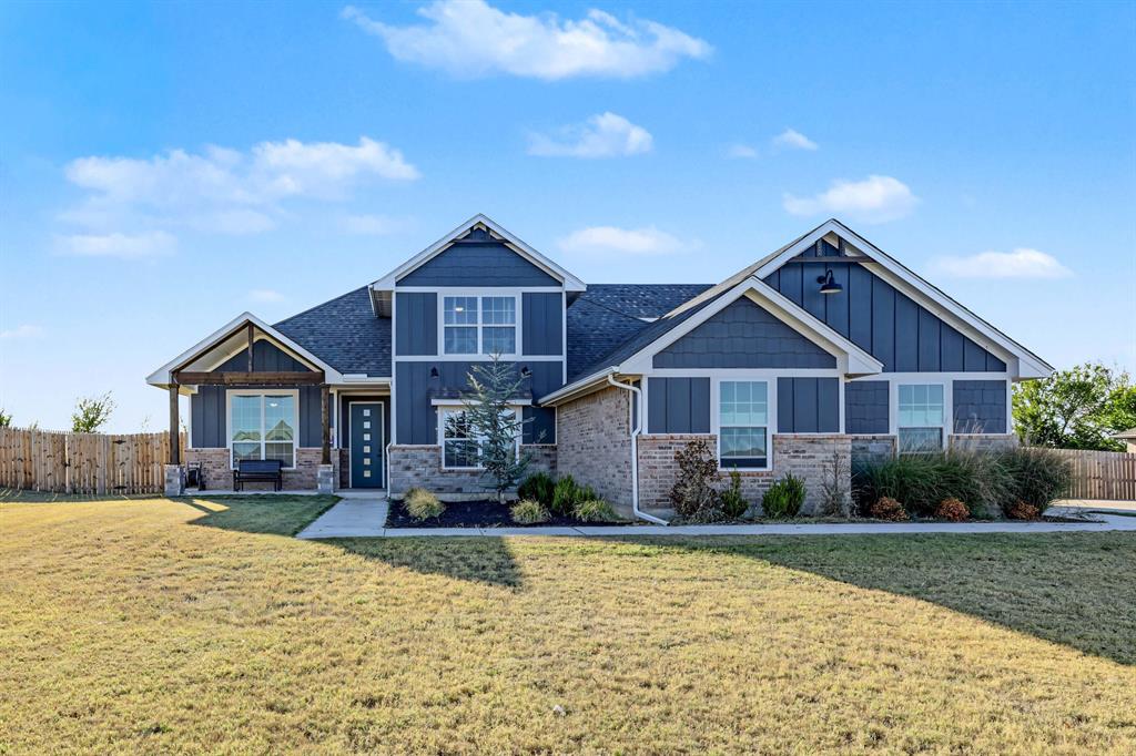 Welcome home to this spacious and functional 2957 square foot home with 5-bedrooms and 3.5-baths. The open floor plan features a welcoming living area with a fireplace and plenty of space for everyday living and entertaining.The main level offers an ideal layout with the primary suite plus three additional bedrooms downstairs. The primary bath features double vanities, a separate soaking tub, walk-in shower, and spacious walk-in closet. Secondary bedrooms include double-door closets for added storage, while a built-in desk area and convenient mud bench add functionality to the home. Upstairs, you'll find a bonus room along with an additional bedroom and full bath, perfect for guests, a home office, game room, or flexible living space.Outside, enjoy the privacy of a large, fenced-in backyard backing to a greenbelt and a vaulted covered patio with a gas outlet ready for grilling. The 3-car garage features epoxy flooring, an electric vehicle charger, and a storm shelter. Additional upgrades include a tankless water heater and Govee exterior lighting with app control. With flexible living spaces, abundant storage, and a.67-acre lot, this home offers room to spread out both inside and out. The neighborhood is perfect for walks and bike rides. Refrigerator, washer, and dryer included. Newcastle Public Schools. Easy access to the highway, shopping, restaurants, and amenities. It's a must see!