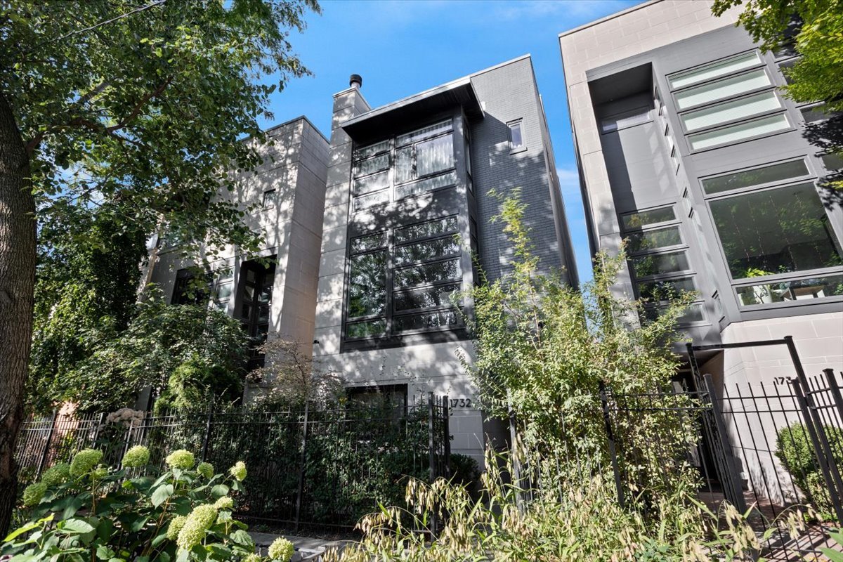Wonderfully modern, six bedroom home in the perfect Bucktown location! This unique floorplan allows for light to flood the entire home and offers architectural details everywhere. At the front of the home is a secluded office and powder room with a formal living room above that overlooks Winchester with floor to ceiling windows. The main level has a large dining room with a huge skylight stories above, an updated kitchen with quartzite countertops and a full wet bar, and a spacious family room at the rear of the home where you can step outside directly at grade to a multi-level outdoor space. One level up is a huge primary suite that includes a fully renovated bathroom with separate shower and tub, double vanity, heated floors, and more. Additionally enjoy a balcony, three closets including two full walk-ins. The next bedroom is the perfect guest suite with an on-suite bathroom, followed by two more bedrooms and side by side laundry. The stairs take you up to the roof where there is the opportunity to build out a roofdeck with great city views. The lower level includes a large recreation room and huge bedroom with an on-suite bathroom or place to create an incredible home gym. This location can't be beat and is walkable to everything Bucktown and Wicker Park offer, the 606, shopping, dining, Churchill Park and the Blue Line!
