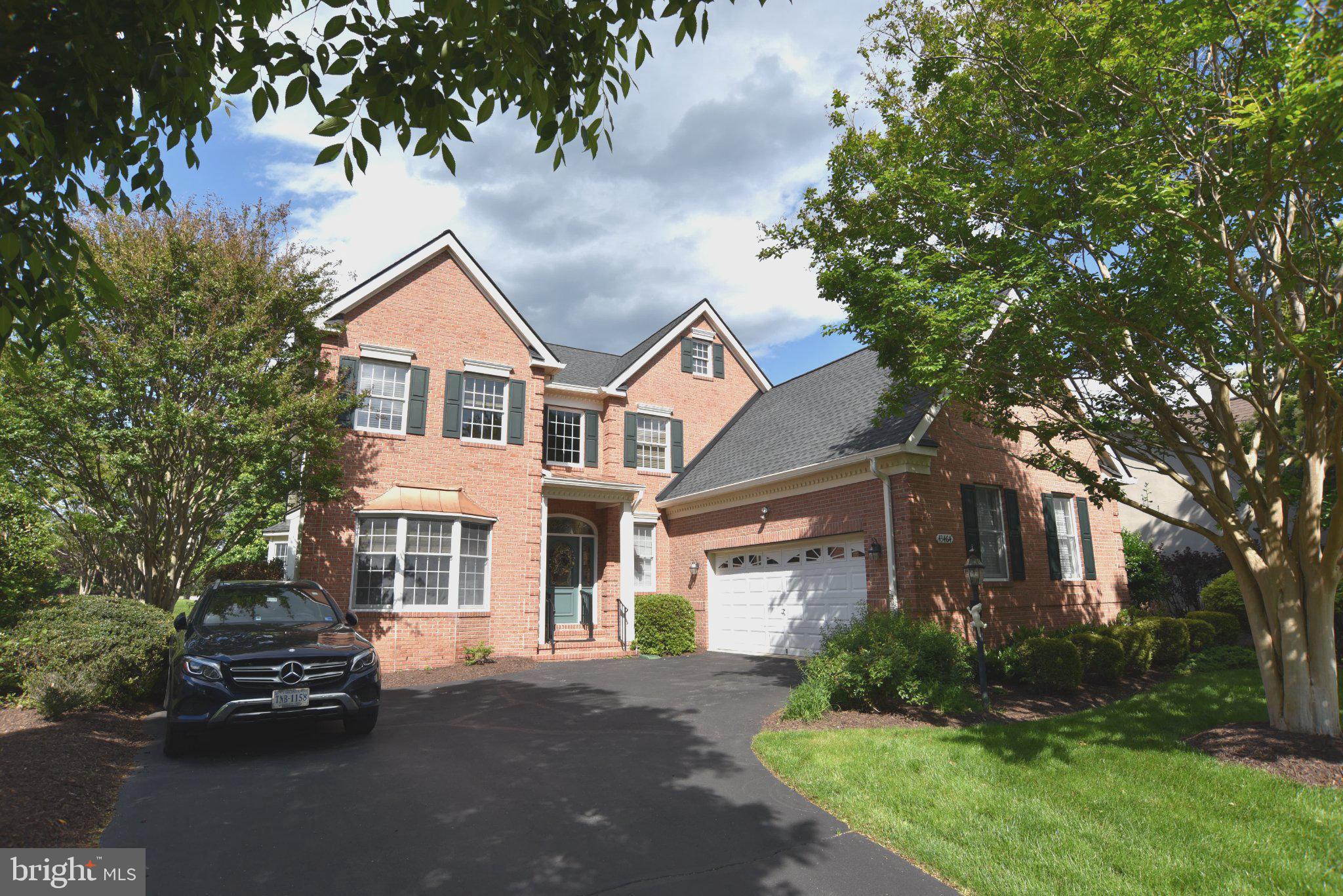 Nestled within the prestigious Belmont Country Club, this exquisite Colonial-style residence offers a harmonious blend of luxury and comfort, perfect for those seeking an elevated lifestyle.  Situated behind the tee box of the 8th hole, you can watch golfers take on this short 161 yard hole from start to finish. Spanning over 3,200 square feet, this home is designed for both relaxation and entertaining, featuring an open floor plan that seamlessly connects the gourmet kitchen, dining area, and family room. Step inside to discover a warm and inviting atmosphere, accentuated by rich wood floors and abundant natural light streaming through elegant bay and casement windows. The heart of the home, the remodeled gourmet kitchen, boasts upgraded countertops, a down-draft cooktop, double ovens, and a spacious layout that invites culinary creativity. Retreat to the luxurious main level primary suite, where tranquility reigns. The en-suite bathroom features modern amenities and thoughtful design, ensuring a spa-like experience at home. Additional highlights include built-ins for added storage, recessed lighting that enhances the ambiance, and tasteful window treatments that provide both privacy and style. The outdoor space is equally impressive, with a private deck overlooking the lush golf course, creating an idyllic setting for morning coffee or evening gatherings. The property is situated on a premium cul-de-sac lot, offering both serenity and exclusivity. Belmont Country Club is not just a home; it's a lifestyle. Enjoy access to a wealth of community amenities, including outdoor pools, tennis courts, and walking paths, all within a secure, gated environment. For golf enthusiasts, membership options are available, allowing you to indulge in the sport right at your doorstep. With a two-car attached garage and ample driveway space, convenience is at your fingertips. The community also provides comprehensive services, including lawn care, snow removal, and high-speed internet, ensuring a low-maintenance lifestyle that allows you to focus on what truly matters. This residence is more than just a property; it's a sanctuary where luxury meets comfort, offering an unparalleled living experience in one of the area's most sought-after communities. Embrace the opportunity to call this stunning home your own and enjoy the exclusive lifestyle that awaits.  New roof 4/21.  HVAC units replaced in 2017 and 2018.  Kitchen appliances in 2017 & 2025. Primary bath remodel 11/19. Main level window treatments 10/22.