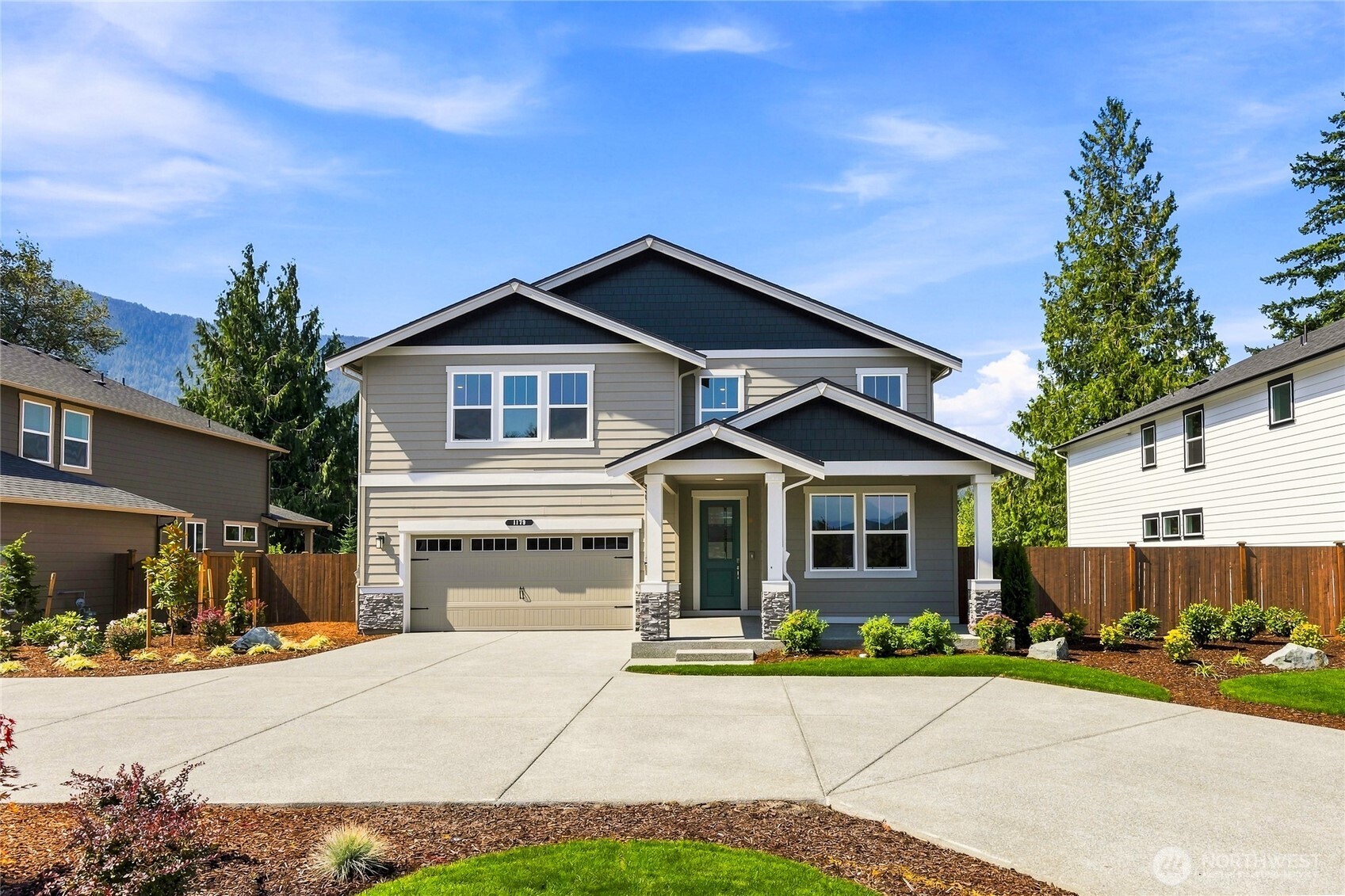 "Home of the Week"! The Stafford at Harrison Court at Harrison Ct. by America’s #1 Builder D.R. Horton set on homesite 19 in North Bend, offers a rare opportunity to own a home where breathtaking mountain views and exceptional outdoor living come together. This thoughtfully designed residence showcases scenic vistas from all six bedrooms, a main-level home office across from the bathroom, a spacious bonus room, and an expansive great room that flows seamlessly into the oversized kitchen. The chef-inspired kitchen features a large island, walk-in pantry, and stainless-steel appliances—ideal for both everyday living and entertaining. Step outside to enjoy sweeping North Bend views—an outdoor space designed for relaxing, gathering, and making memories. Upstairs, double doors open to a private primary retreat, while four additional bedrooms each feature walk-in closets. A highly desirable 3-car garage offers ample space for vehicles, storage, and hobbies. Complete with landscape, irrigation and fencing. Located in the sought-after Snoqualmie Valley School District with easy access to Seattle, Bellevue, and Kirkland, this home blends comfort, space, and scenery in an unbeatable setting. Ask about our $25,000 buyer bonus and special rate with our preferred lender for qualified buyers. Buyers must register their broker on site at their first visit, including open houses.