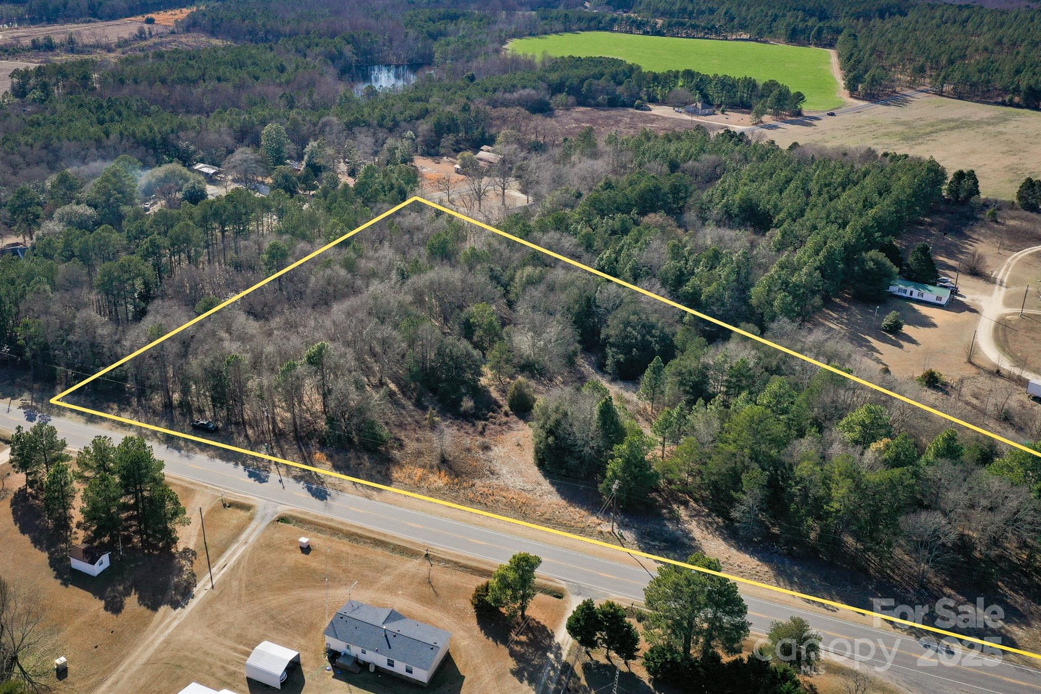 Check out the perfect place to build your dream home on this expansive 7-acre lot, ideally located along Hwy 220 between Ellerbe and Candor NC. The lot is flat, with mixed pines and hardwoods, and already perked and ready to go. Plenty of road frontage to subdivide or create a second entrance for a shop or other building. Mongomery County water available. Check this one out while you still can!