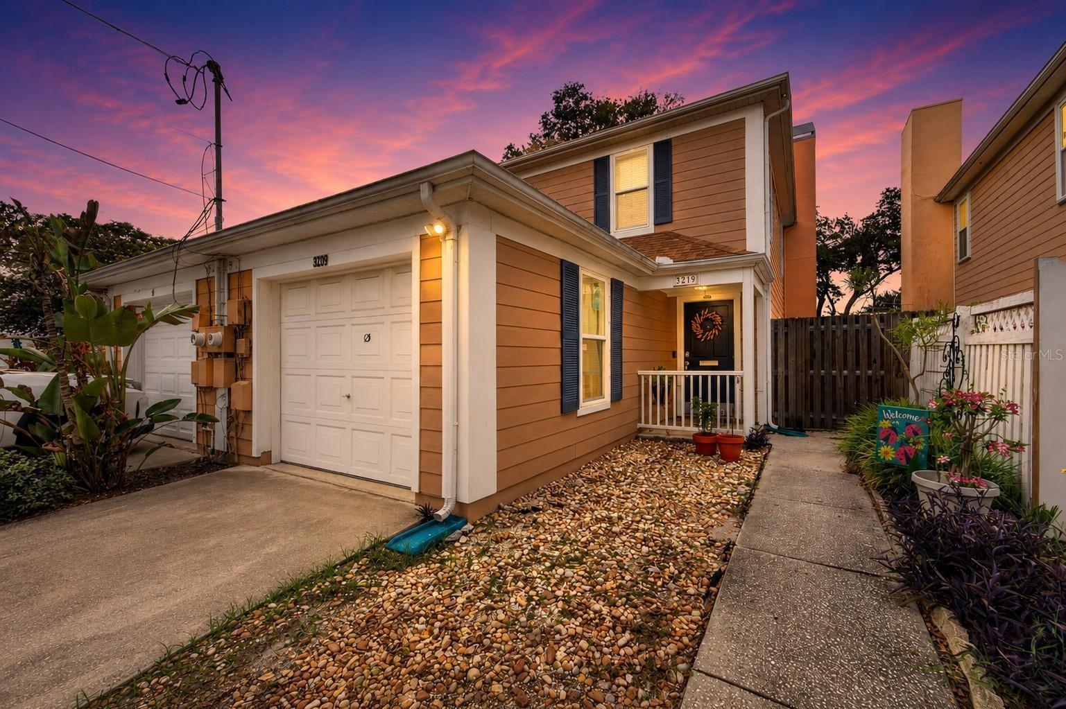Location, Location, Location! Don't miss this opportunity to own this townhome in the heart of South Tampa's highly desirable Palma Ceia Park. Just minutes from Palma Ceia Country Club, scenic Bayshore Boulevard, the Le Roy Selmon Expressway, shopping, dining, and Tampa General Hospital, you'll love the convenience this location offers. Situated in a non-flood zone for added peace of mind, this 2-bedroom, 2.5-bath townhome with a 1-car garage offers comfort and convenience. Step inside to a welcoming foyer with a convenient half bath that leads to the kitchen and great room.  The kitchen features wood cabinetry and stainless-steel appliances. The great room is perfect for relaxing or entertaining, complete with a cozy fireplace and French doors that open to a private covered patio and fenced backyard—ideal for morning coffee, outdoor dining, or pets.  Upstairs, both bedrooms offer the privacy of their own ensuite bathrooms. A dedicated laundry closet with an included washer and dryer adds everyday convenience.  Recent updates include new first-floor flooring (2026), roof (2021), A/C (2018), and double-pane windows (2024), giving you added confidence and value.  Located within the highly sought-after Plant High School District, this home is perfect as a primary residence, seasonal getaway, or investment property. Enjoy the best of South Tampa living with everything you need just moments from your front door.