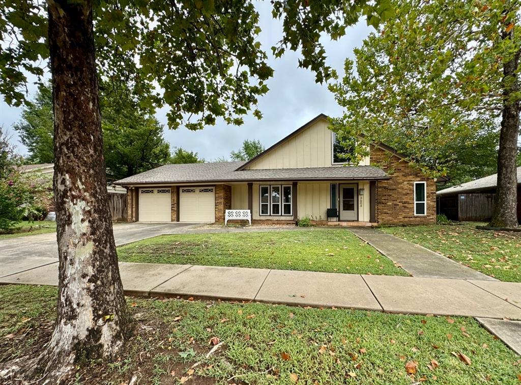 Stunning 70's contemporary home in coveted SE Edmond sitting on a lush 1/4 Acre lot! Entry den with formal dining space and built in shelving. Open kitchen with new stainless gas range, microwave and abundant cabinet/counter space. Breakfast area w/ closet that flows to the upstairs overlook living space with half bath and charming office/work space w/ built-in desk and crafting table. Tons of built-in storage throughout. All 3 bedrooms lie downstairs along with tastefully updated full bathrooms. Large sunroom off garage/kitchen area that leads out back. Large 2 car garage featuring in-ground storm shelter. Perfect backyard retreat and entertainment space with pergola, several sitting area's w/ furniture providing the ideal balance of nature whilst residing in the city within close proximity to all amenities and the turnpike. Available Now for ASAP Lease start/Move-in day.