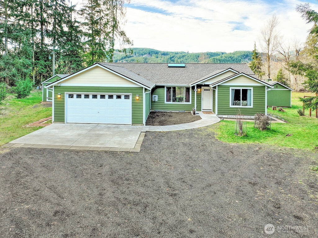 Beautiful Cathlamet -- NEWER Built in 2022 -- 1 Level -- PRIVATE & SECLUDED -- 2.34 ACRES -- Riverfront -- 3 Bedroom / 2 Bathroom -- 1721 Sqft -- Open Great Room Concept -- Living Room w/ Fireplace -- Kitchen w/ Island, Eating Bar, Stainless Appliances & Pantry -- Dining Room -- Primary Bedroom w/ Walk-in Closet & Full Bathroom -- Laundry Room -- Heat Pump & AC -- Vaulted -- Skylights -- Recessed Lighting -- Vinyl Windows -- Attached Double Garage -- HardiPlank Siding -- 2 Workshop / Sheds -- Trees -- Yard -- Garden Space -- RV Parking -- Septic -- Individual Well -- Dead End Street -- Located Near Outdoor Recreation Opportunities