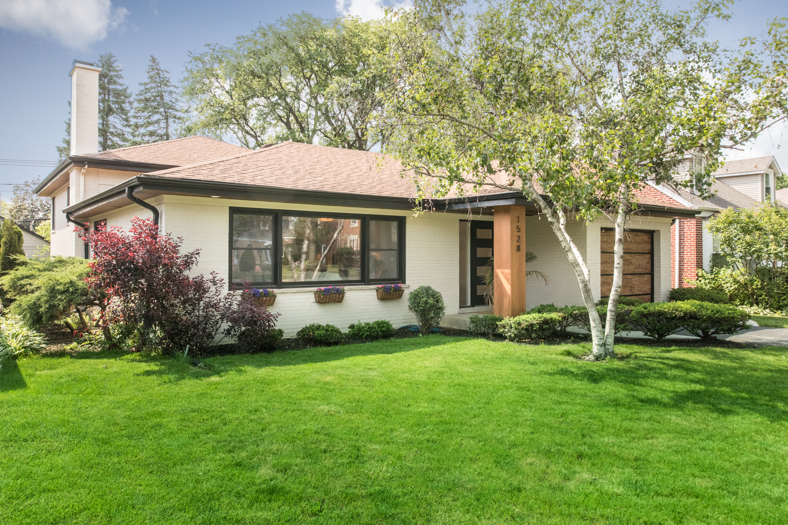 Highly sought after neighborhood and school district! Beautifully serene and completely renovated. This bright and airy oasis boasts vaulted ceilings, providing architectural beauty and spaciousness. The inviting kitchen provides plenty of storage as well as a stunning waterfall countertop. Upstairs welcomes you to three bedrooms and a large double vanity bathroom with a shower that rivals Architectural Digest! The lower level has a second full gorgeous bathroom and bright living room with large stone fireplace complete with a walkout to the backyard. Additional office space off the kitchen can also be used as a zen reading nook and mudroom! At night enjoy ambiance lighting both in the kitchen and the outdoors. New energy saving windows, new electrical and all work done with permits. Large crawlspace for plenty of storage. This home will leave you breathless!