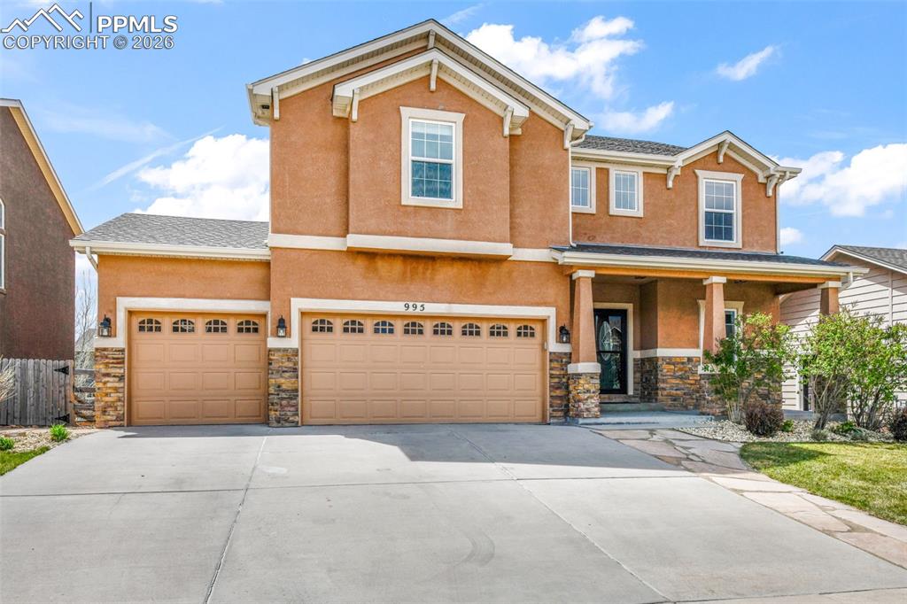 This exceptional two-story home is the perfect blend of comfort, style, and functionality—truly move-in ready and designed to impress. From the moment you arrive, you’ll be captivated by the breathtaking mountain views, inviting deck and patio, and the highly desirable walk-out basement that fills the home with natural light. Step inside to discover a thoughtfully refreshed interior featuring new carpet, newer flooring, and beautifully updated stair treads. The main level offers an elegant and spacious layout, including a dedicated office, convenient half bath, and an expansive living room anchored by a cozy fireplace. A formal dining area flows seamlessly into the stunning kitchen, complete with granite countertops, a gas stove, and an oversized pantry—perfect for both everyday living and entertaining. Upstairs, you’ll find a versatile loft space ideal for relaxing or gathering, along with two well-appointed bedrooms, a full bathroom, and a generously sized laundry room. The luxurious primary suite is a true retreat, offering sweeping mountain and city views, a spa-like five-piece bath, and a walk-in closet that conveniently connects to the upper-level laundry. The walk-out basement provides incredible flexibility, featuring a bright and spacious family room with a wet bar, two additional large bedrooms, a full bathroom, and a second laundry area—ideal for multi-generational living or hosting guests. Outside, the backyard is an entertainer’s dream with ample space for gatherings and plenty of room for pets to roam. Additional highlights include a three-car garage, air conditioning, updated lighting, and numerous thoughtful upgrades throughout. This is a home where elegance meets everyday livability—ready for you to move in and enjoy.