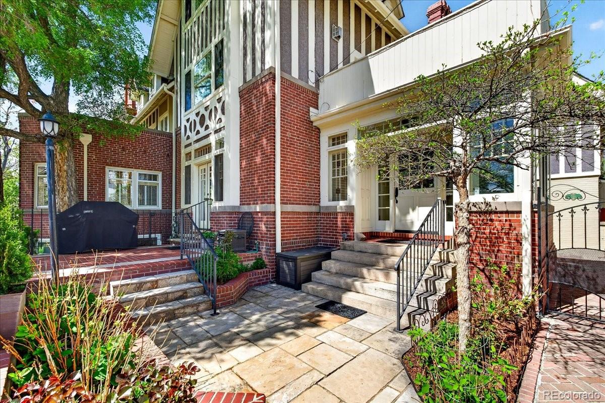 This 7th Avenue Historic District home features exquisite architectural details and spacious living areas combined with contemporary comfort. Located on a quiet block with easy access to Cherry Creek, Denver Country Club, downtown, parks, restaurants, museums and the Botanic Gardens. Highly walkable on tree lined streets and a designated bikeway on 7th Avenue. Convenient to groceries, hospitals, banking, and other necessities.This William Fisher designed home welcomes you through wrought iron gates to a grand entry foyer leading to a beautiful, updated living room. Pass through the French doors to a very large brick patio outside for easy entertaining with wide open views. Inside on the main floor continue to a gourmet kitchen that opens to the dining room and an elegant powder room.Upstairs you will find all large, sun-filled bedrooms and baths, some currently used as offices and flex space. The Primary suite also opens to a large outside deck. This home has 3 fireplaces, 4 bedrooms, 3 ½ baths, all storm windows with screens, a large basement for storage/exercise/hobbies, and an oversized attached 2-car garage. A home of enduring beauty, purposefully updated for modern life. Ready for you to move in.