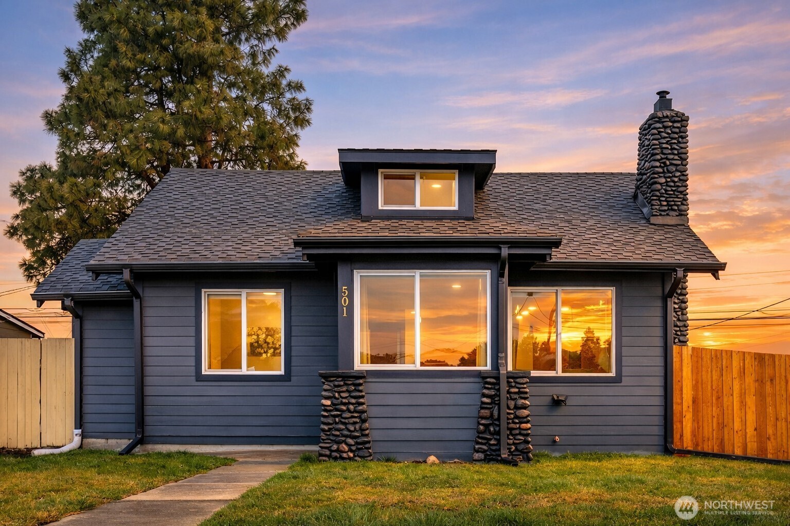 Fully remodeled and move in ready, this home blends modern updates with flexible living space and future potential. Interior and exterior paint, new flooring, brand new stainless steel appliances, updated plumbing, and two beautifully remodeled bathrooms have already been completed, allowing you to simply move in and enjoy.    The main level offers 2 bedrooms and 2 bathrooms, while the fully finished upstairs creates additional living flexibility perfect for a third bedroom, home office, den, or creative space. A back porch leads to a clean and spacious basement that could serve as an entertainment area, hobby room, or additional storage.    A standout feature of the property is the oversized 620 square foot detached garage. Already equipped with its own electrical meter and water and sewer plumbing, the space offers exceptional potential for a future DADU, guest quarters, workshop, or studio.    With extensive upgrades, versatile living areas, and rare ADU potential, this property offers opportunity for homeowners, investors, or anyone seeking space, flexibility, and long term value.