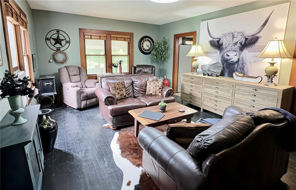 Fully Furnished Charmer with Modern Upgrades & Huge fenced Yard!Prepare to be blown away! This move-in-ready 2-bedroom, 1-bathroom gem built in 1948 combines vintage character with modern convenience, and best of all, it comes fully furnished! Just bring your toothbrush and unpack.Interior Features:Move-In Ready Convenience: Comes completely furnished, taking the stress and cost out of moving.Character & Charm: LVP and original hardwood floors, restored original wood trim, and vintage door knobs throughout.Upgraded Kitchen: Outfitted with a high-end stainless steel appliance package, featuring a 5-burner gas stove and a built-in wine refrigerator for effortless entertaining.Bathroom: Clean and functional featuring a sleek stand-up shower.Exterior & Bonus Spaces:Unfinished Basement: A full basement offering tons of storage or potential extra living space, complete with an overhead garage door for convenient equipment storage or parking.Outdoor Oasis: A sliding glass door off the kitchen opens to a spacious deck overlooking an incredible, nearly half-acre fully-fenced yard with stunning mature landscaping. Perfect for pets, gardening, or relaxing outdoors.Unbeatable value, historic charm, and turn-key convenience all for just $125,000. Properties packed with this much value don't last long. Schedule your showing today.