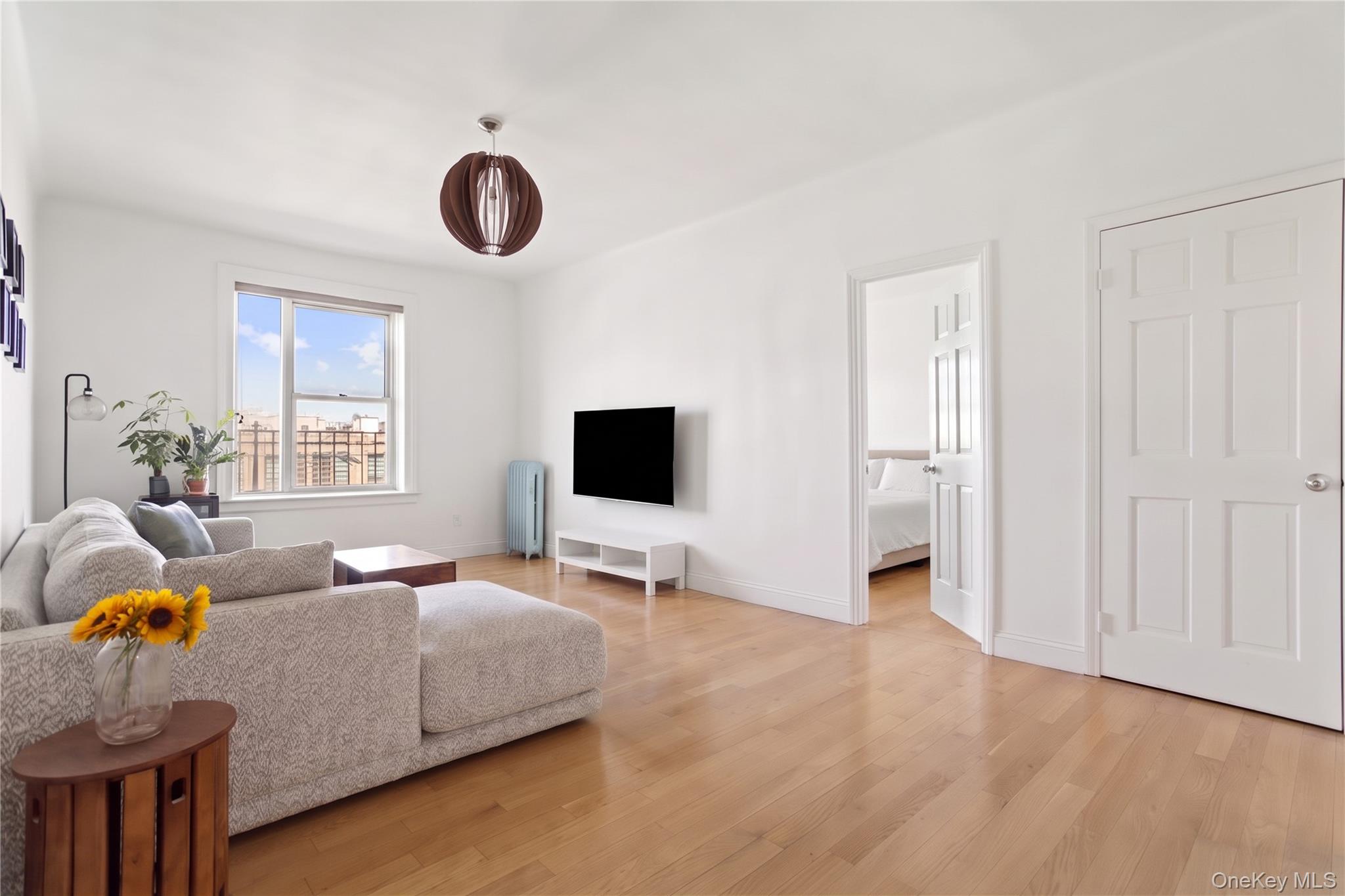Welcome to your new home, where space, sunlight and an unbeatable Sunnyside location come together. This beautifully updated 2-bedroom, 1.5-bathroom home offers the kind of layout that is increasingly hard to find in Queens: generously proportioned rooms, excellent natural light, an open feel and a renovated kitchen designed for everyday living.From the moment you enter, the apartment feels bright, airy and surprisingly spacious. The sizable living room is filled with northern light and offers plenty of room to create distinct living and dining areas without feeling crowded. Large windows, high ceilings and warm hardwood floors add to the home's sense of openness, while the clean, contemporary finishes make it easy to move right in.The fully renovated kitchen is a standout. Thoughtfully designed with abundant cabinetry, generous counter space, modern appliances, a sleek backsplash and best of all a window bringing in natural light and ventilation. Whether you're cooking a quick weeknight dinner or entertaining friends, there is room to actually enjoy the kitchen rather than simply pass through it.The primary bedroom is genuinely spacious and can comfortably accommodate a king-size bed, with additional room for nightstands and furnishings. The second bedroom offers wonderful flexibility and is perfectly suited as a guest room, home office, nursery, or second bedroom depending on your needs. A convenient half bath adds another level of functionality that you don't often find in a two-bedroom apartment at this price point.The apartment is located on the fourth floor of a walk-up building, giving the home a nice elevation and an abundance of natural light. The living room and primary bedroom face north towards Queens Boulevard and the elevated 7 train. As with any home directly near an elevated subway line, some train and street sounds can be heard. The fourth-floor elevation helps, and for many buyers, the trade-off is well worth it for the incredible convenience and location.And then there's Sunnyside itself!Step outside and you're immediately in the middle of one of Queens' most beloved neighborhoods. The 7 train at 40th Street–Lowery is essentially right outside your door, making the commute to Manhattan remarkably convenient. But the real appeal of Sunnyside is that you don't have to leave the neighborhood to have a great day.Queens Boulevard, Skillman Avenue and Greenpoint Avenue are lined with restaurants, cafés, pubs, markets, shops and neighborhood favorites, with such a variety of cuisines. It's a neighborhood with a distinctly local feel friendly, residential, and full of places worth discovering.Back at home, residents enjoy a beautiful, landscaped courtyard, providing a peaceful escape from the energy of Queens Boulevard, along with a laundry room and other convenient building amenities. The building is a classic pre-war co-op dating to 1922, with a gated courtyard and a strong neighborhood presence. Bring your Pets and subletting allowed after 1 year! If you're looking for a home that gives you actual room to live in, a kitchen you'll enjoy using, bedrooms that aren't afterthoughts, abundant natural light and one of the most convenient locations in Sunnyside, C44 deserves a closer look.Come see the space in person, you may be surprised by just how much apartment you're getting.