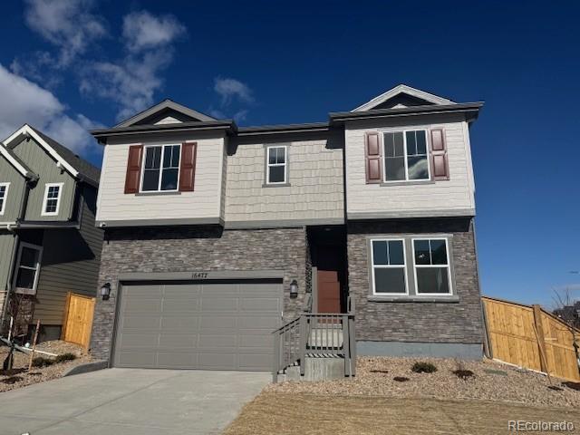 What's Special: High Ceilings | Loft | Flex Room | Corner Lot | No Rear Neighbors. New Construction - Ready Now! Built by America's Most Trusted Home Builder. Welcome to the Ridgway at 16477 W 92nd Place in Trailstone Town Collection! This stunning new home features an expansive kitchen with a walk-in pantry and an eat-in island overlooking the dining area and great room with its cozy fireplace and airy volume ceiling. A sliding door leads to the covered patio, perfect for relaxing outdoors. The front of the home includes a flexible space for work or play, along with a convenient powder room. You’ll also appreciate the two-car garage with extra storage space for everyday ease. Upstairs, a spacious loft connects two secondary bedrooms, a full bath, a dedicated laundry room, and a private primary suite with an en-suite bath and large walk-in closet. Discover Trailstone, a new home community on the edge of the Rocky Mountains in Arvada, CO. Just off Candelas Parkway and only 15 miles from Boulder, find room to roam in stunning single-family homes with spacious backyards in Arvada. You'll love the incredible views of Downtown Denver, the Rocky Mountains and Standley Lake. With incredible planned amenities including an outdoor pool and pickleball courts, every day is an opportunity to explore a new path at Trailstone. Additional Highlights Include: Fireplace at great room, sliding glass door at great room, 8' interior doors at main level, covered patio, and built-in appliance package. Interior photos are for representative purposes only. MLS#6534046