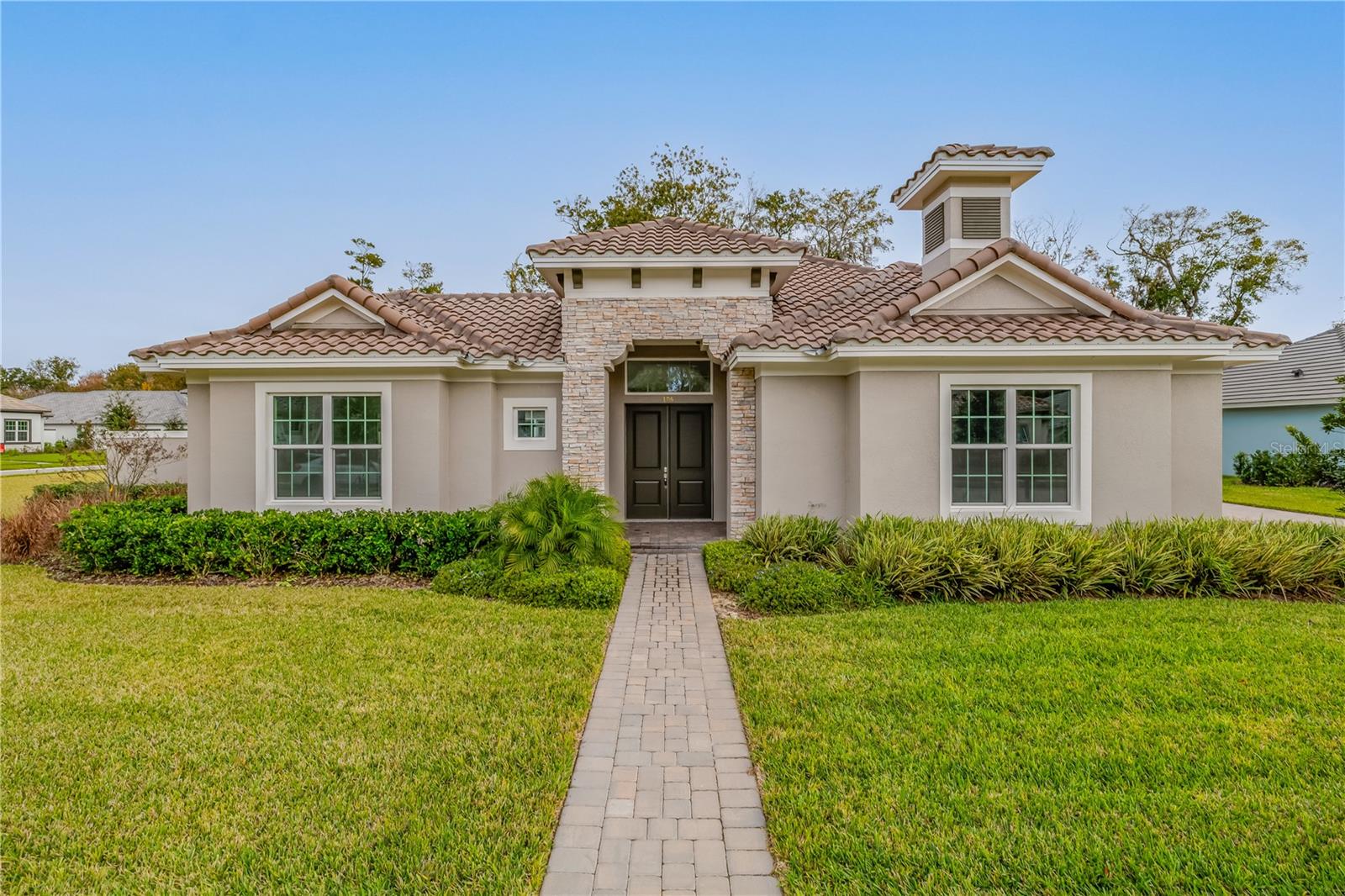 Luxury just Became More Attainable!!!!Welcome to this stunning courtyard-style contemporary home in the well-established Toscana community by the highly respected ABD Development, featuring one of the builder’s most desirable courtyard models with a classic tile roof, thoughtfully designed to provide privacy, elegance, and a refined coastal lifestyle while remaining minutes from everyday conveniences and approximately five minutes from the beach, showcasing a private resort-style courtyard with pool and spa that defines the heart of the home and sets a relaxing tone from the moment you arrive, wide sliding glass doors throughout creating seamless indoor-outdoor living and allowing the courtyard to become a natural extension of the interior, especially in the evening when the pool is softly illuminated, an open Kitchen and Family Room combo designed for both everyday comfort and entertaining, highlighted by a bright, ultra-modern  kitchen with clean lines, sleek finishes, well-appointed appliances, and built-in ceiling speakers allowing you to enjoy music while cooking or hosting, with wide sliding doors opening fully to create an airy, open atmosphere perfect for relaxed gatherings, a private guest suite thoughtfully positioned off the courtyard with its own full bath and sliding glass doors, offering true separation and privacy for guests or a home office, a true primary retreat with direct access to the courtyard through sliding glass doors, tray ceilings adding architectural depth, and a spa-inspired primary bathroom featuring a freestanding soaking tub, glass-enclosed shower, and elegant quartz vanities, complemented throughout by clean contemporary architectural lines, tray ceilings, refined trim work, upgraded baseboards, a Level 4 smooth drywall finish with modern square corners, solid-core interior doors for enhanced sound insulation, an attached three-car garage, and a well-positioned lot within an established upscale community, creating a distinctive contemporary residence designed to be lived in, enjoyed, and truly experienced.