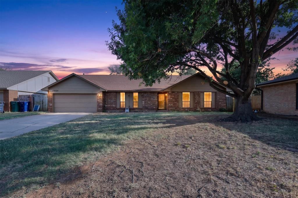 Exceptional value in a highly desired, quiet neighborhood! This spacious home is tucked into a semi-cul-de-sac setting and offers an impressive combination of updates, abundant storage and beautiful original character. Fresh interior paint, new carpet being installed this week and brand-new fixtures to compliment the original woodwork.The home features two generous living areas connected by a **wide cased opening**, creating an open, natural flow while still maintaining two distinct spaces. The den features a wood-burning fireplace with a built-in bookcase, adding warmth and character to the space.The spacious kitchen offers abundant cabinetry and a bar with storage above and below, plus the **stainless steel refrigerator stays with the home**. New fluorescent light fixtures with new acrylic diffuser panels to be installed this week. A butler’s pantry leading into the kitchen provides additional cabinetry and storage along with a built-in desk and workspace—perfect for a home office, homework station or household command center. A separate dedicated laundry room adds even more functionality.The spacious primary bedroom offers two walk-in closets, while both full bathrooms feature tub/shower combinations. Outside, enjoy a fully fenced backyard with a patio, 10x10 storage shed and two established pear trees. An oversized two-car garage provides additional parking and storage.Additional highlights include a water heater approximately two years old, an HVAC system approximately nine years old and a roof approaching its 10-year mark that is currently insurable and reported to be in great condition.Located in the Putnam City School District, this home delivers exceptional space, storage, updates and character for the price. With its quiet semi-cul-de-sac setting and price positioned to sell, this is an opportunity buyers won't want to miss. Schedule your showing today!