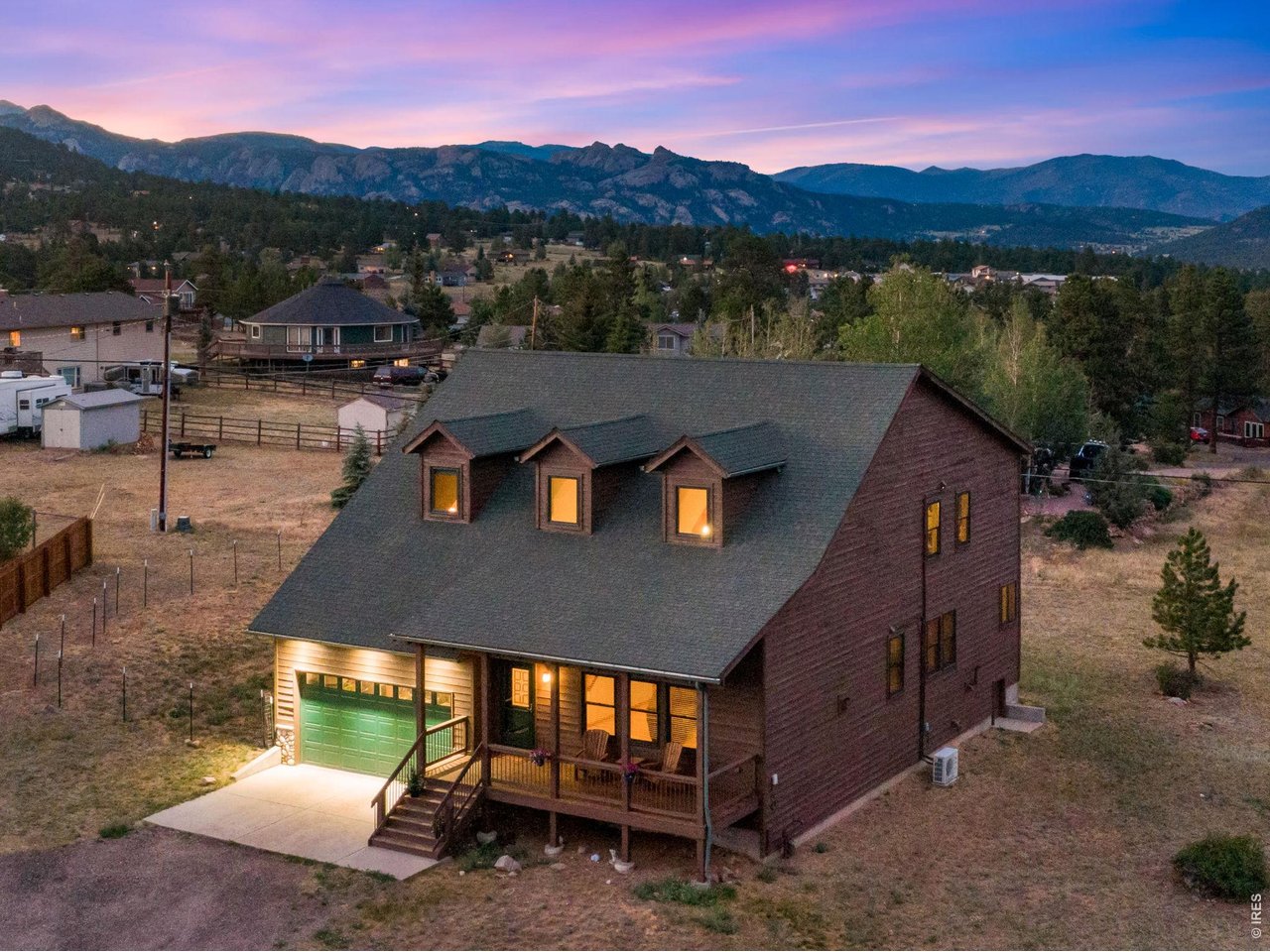 Welcome home to your own mountain retreat, where thoughtful updates and timeless character come together on a level and partially fenced .46-acre lot. Inside, you'll find warm refinished hickory and real barn wood floors, soaring ceilings, radiant in-floor heat, and a spacious loft that makes the perfect second living area, office, work out space or playroom. The beautifully appointed kitchen is designed for gathering with a large island, granite countertops, induction electric oven and abundant workspace, while the formal dining room is ideal for hosting family and friends. The main-level primary suite offers a peaceful escape with generous space, and the home features 3 bedrooms plus an office. Two guest bedrooms are located upstairs along with the expansive loft. Recent improvements provide peace of mind, including all windows replaced within the last four years, new carpet and refinished wood floors in July 2026, a radon mitigation system, and the exterior professionally stained last year. Additional features include mini-split air conditioning, a whole house fan, central vacuum, a full crawl space for extra storage, and beautiful pine accents that add mountain charm. This exceptional mountain home offers the space, updates, and character you've been looking for-all in a peaceful setting that's ready to enjoy.