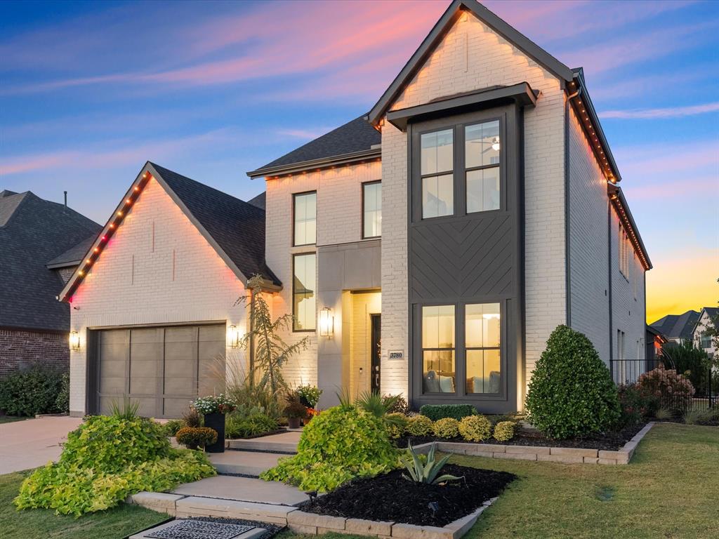 Welcome to this exquisite former model home by Southgate Homes, a true showpiece of luxury and design in the highly sought-after Windsong Ranch community of Prosper, Texas. Situated on an oversized .32-acre lot, this 4,015 sq. ft. modern masterpiece blends elegant architecture with exceptional craftsmanship and thoughtful functionality. Step inside and be greeted by soaring vaulted ceilings adorned with striking wood beams that draw your eye to the breathtaking floor-to-ceiling charcoal Esmer tile fireplace, anchoring the living room in sophistication. The open-concept layout flows effortlessly into a chef’s dream kitchen featuring Calacatta countertops, handcrafted wood cabinetry, stainless steel appliances, and a spacious walk-in pantry. The dining area opens through accordion glass doors to a serene backyard retreat with a heated pool and spa, stunning fire and water features, a turf dog run, and a large side yard, perfect for entertaining or relaxing in style. With four bedrooms and four and a half baths, this home offers both comfort and privacy. Two ensuite bedrooms are conveniently located on the main floor, along with a private office and a dedicated media room ideal for work and leisure alike. Upstairs, a large game room and versatile bonus room provide additional space for family activities or creative pursuits. Every corner of this home reflects designer touches and model-home quality finishes, from the carefully curated fixtures to the seamless blend of textures and tones throughout. Located in one of Prosper’s premier communities, residents of Windsong Ranch enjoy access to resort-style amenities, including the renowned five-acre Crystal Lagoon, miles of scenic trails, pools, fitness centers, tennis and pickleball courts, basketball court, fishing ponds, a community garden, a café, and a calendar of vibrant community events. Request a list of all the upgrades from your favorite Realtor and book your private showing today.